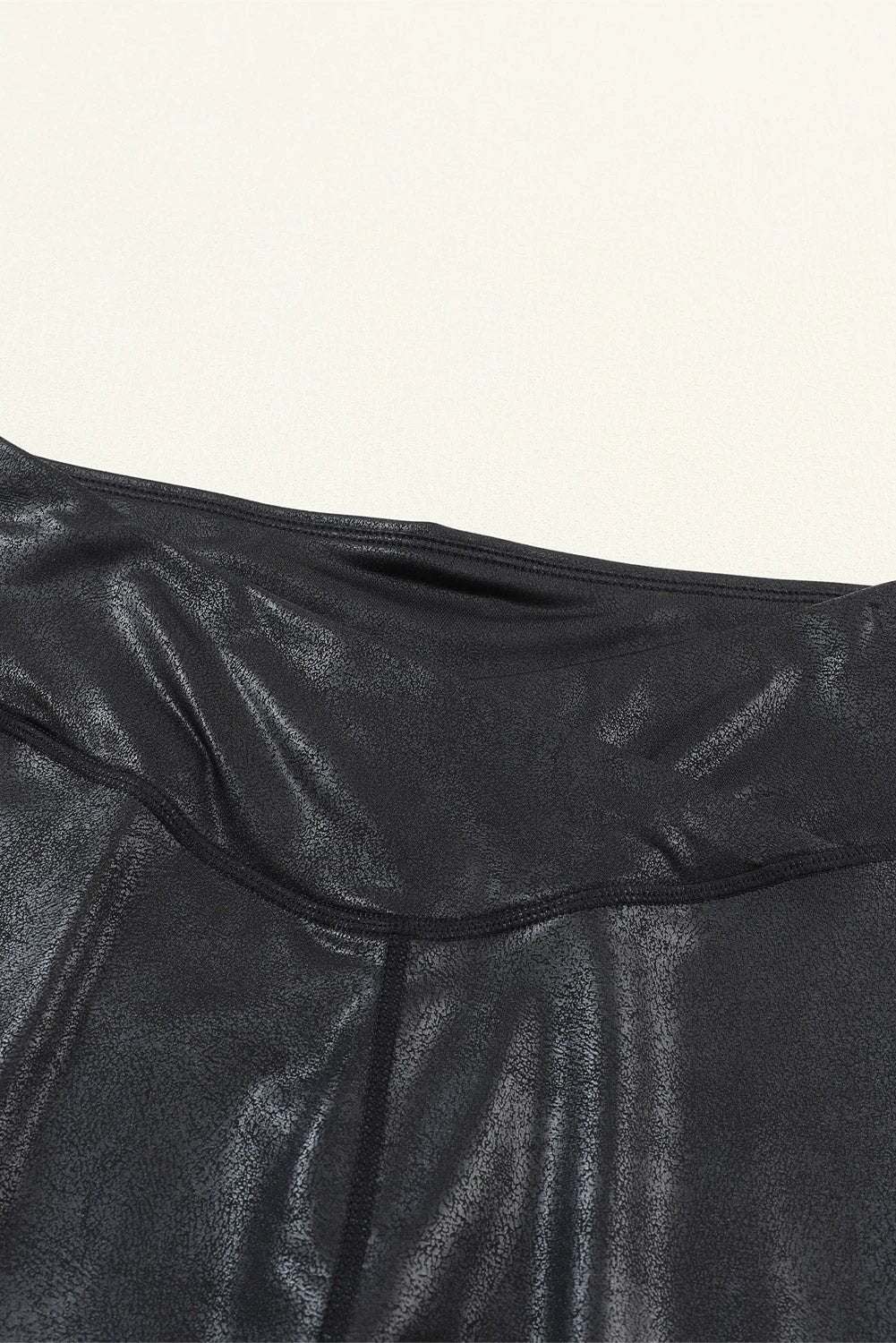 black crossed dip waist sleek leather leggings for women casual everyday outfit