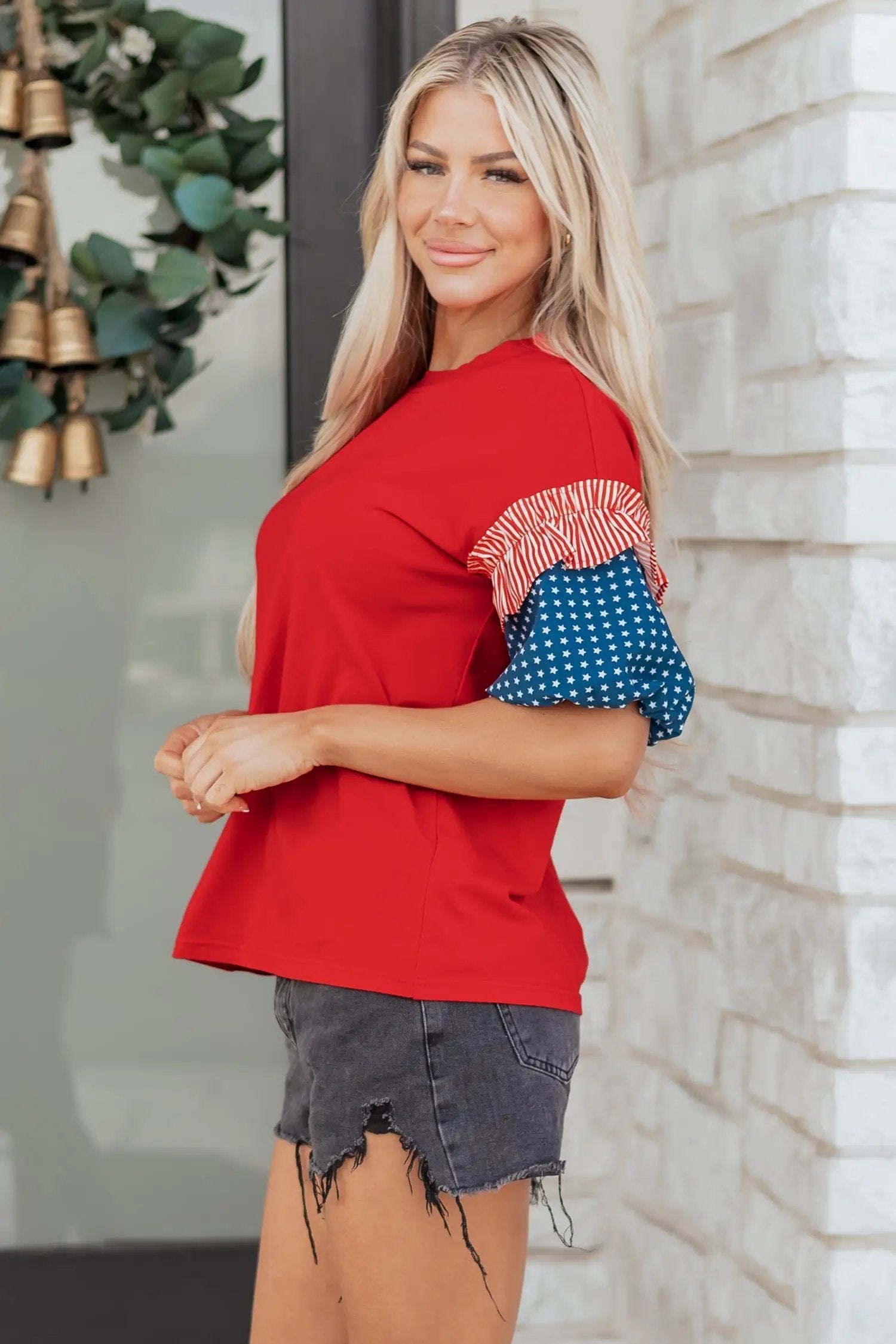 Stars stripes puff sleeve top with fiery red stars stripes and American flag print