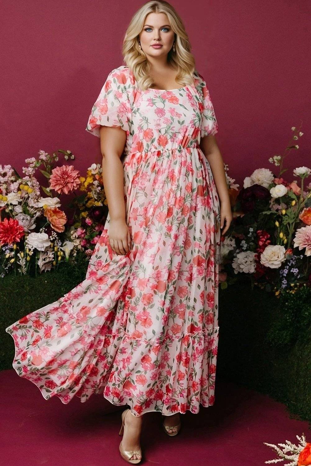 Plus size pink floral maxi dress with square neckline and puff sleeves, perfect for garden parties and summer events.