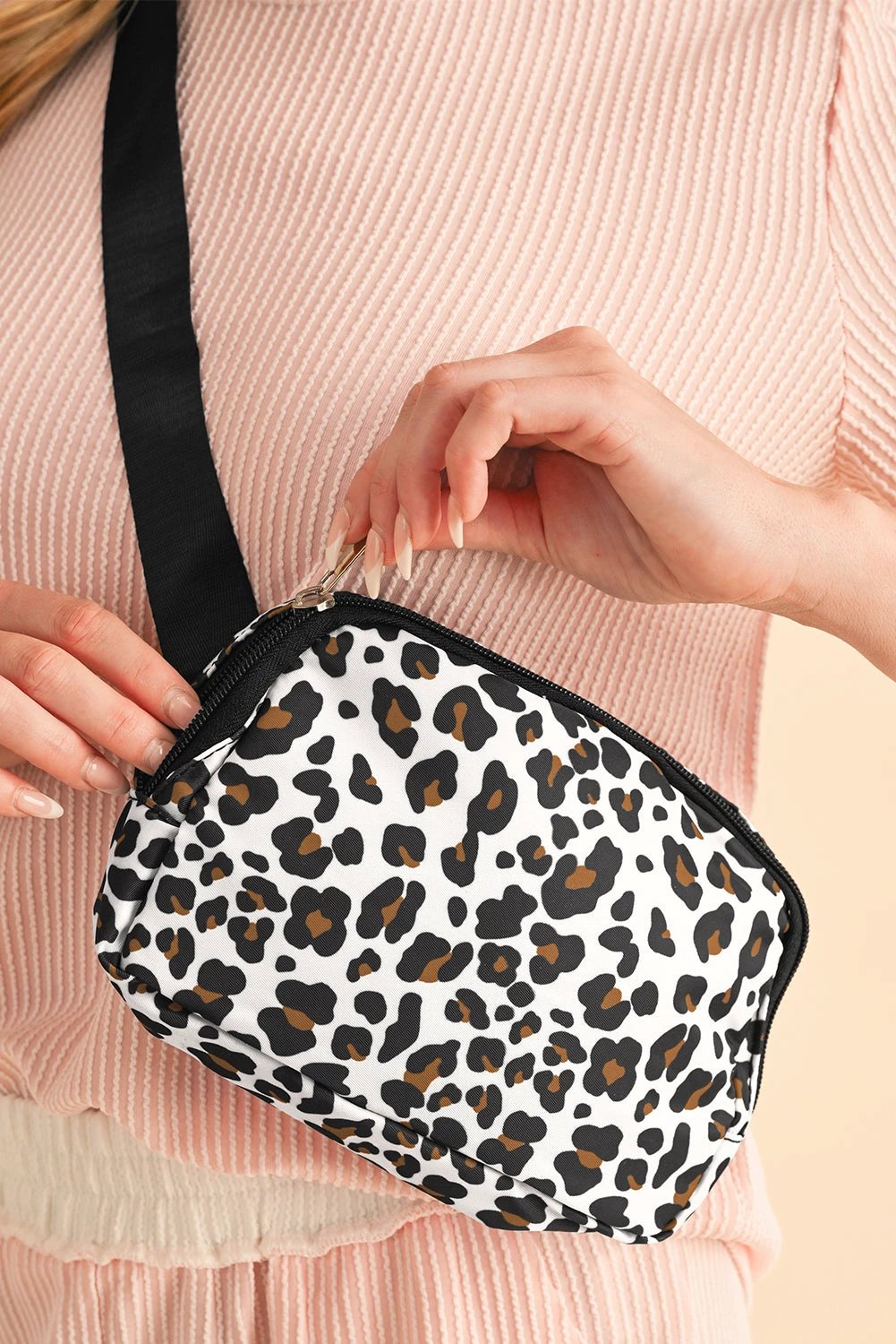 White cheetah print crossbody bag with multi interlayer zipped compartments for organized everyday use