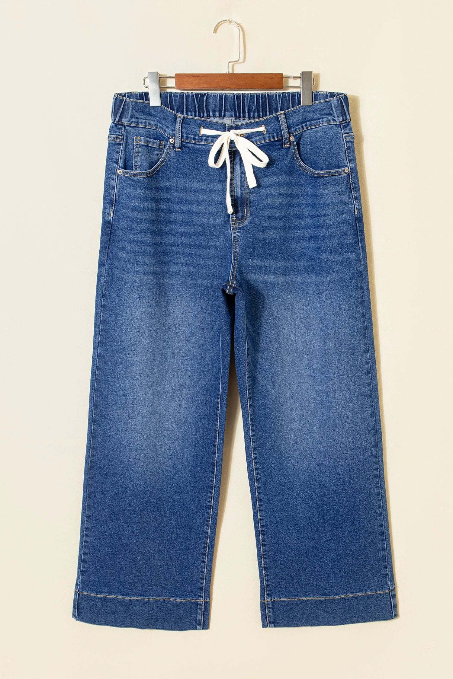 Plus size acid wash jeans with lace-up waist and wide leg, Main Character Energy style