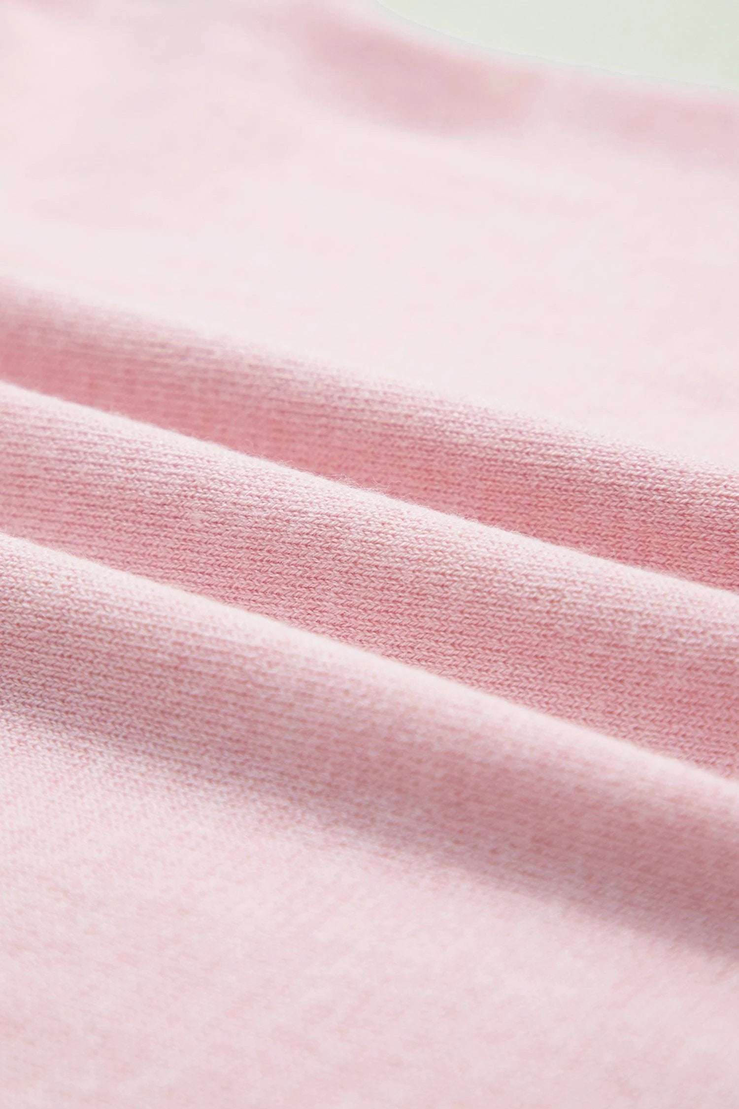 Pink lace trim V-neck short sleeve knit sweater with scalloped edge and relaxed fit