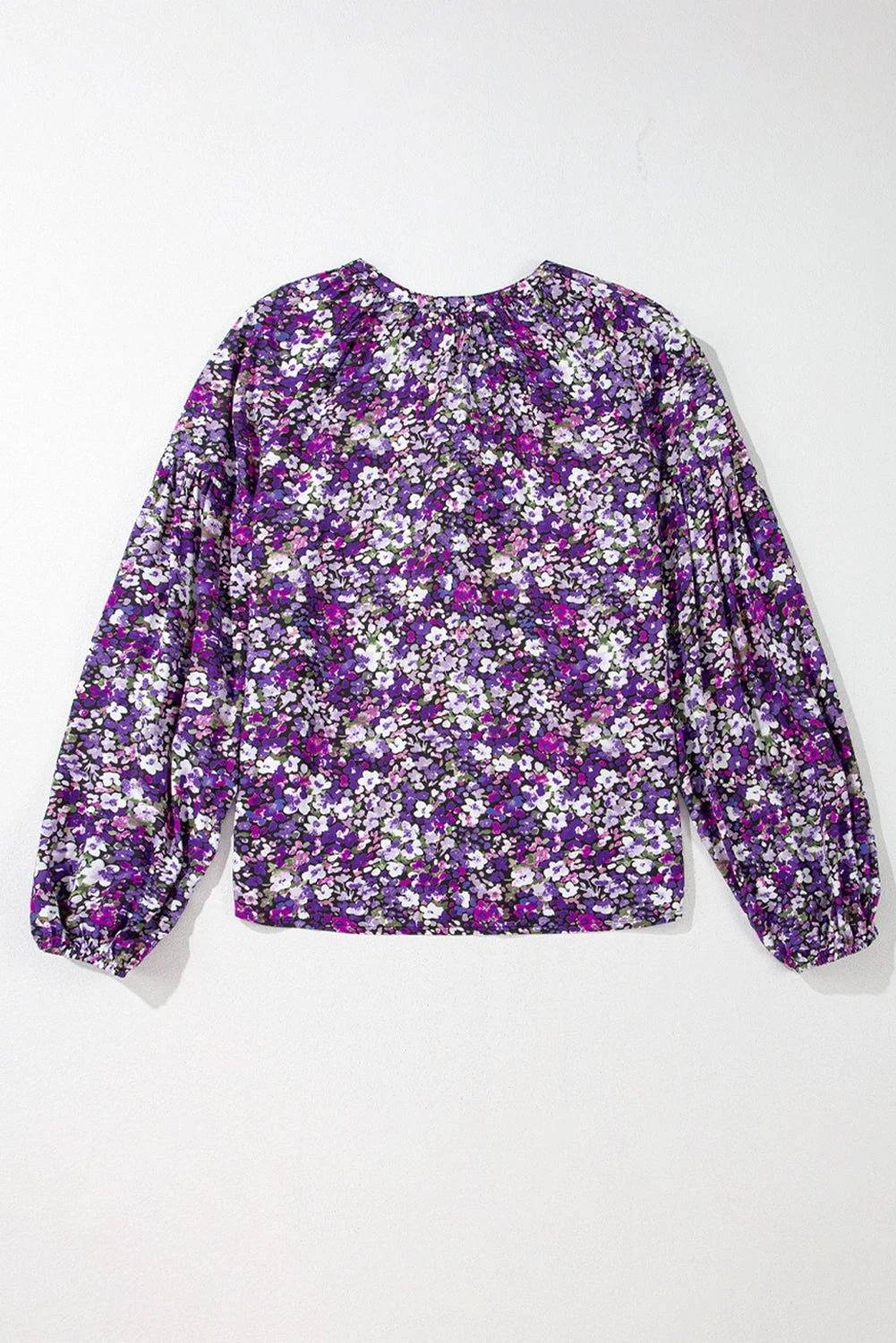 Purple floral Boho Bloom blouse with split V-neck and bubble sleeves