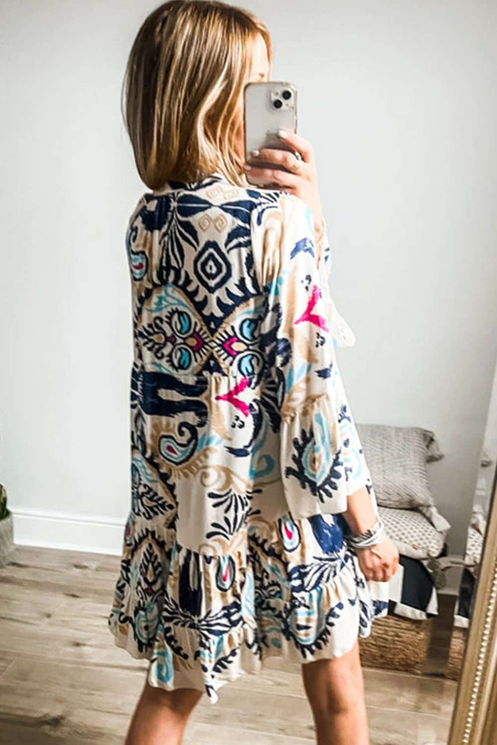 Printed Tribal Mini Dress with buttoned front and bracelet sleeves