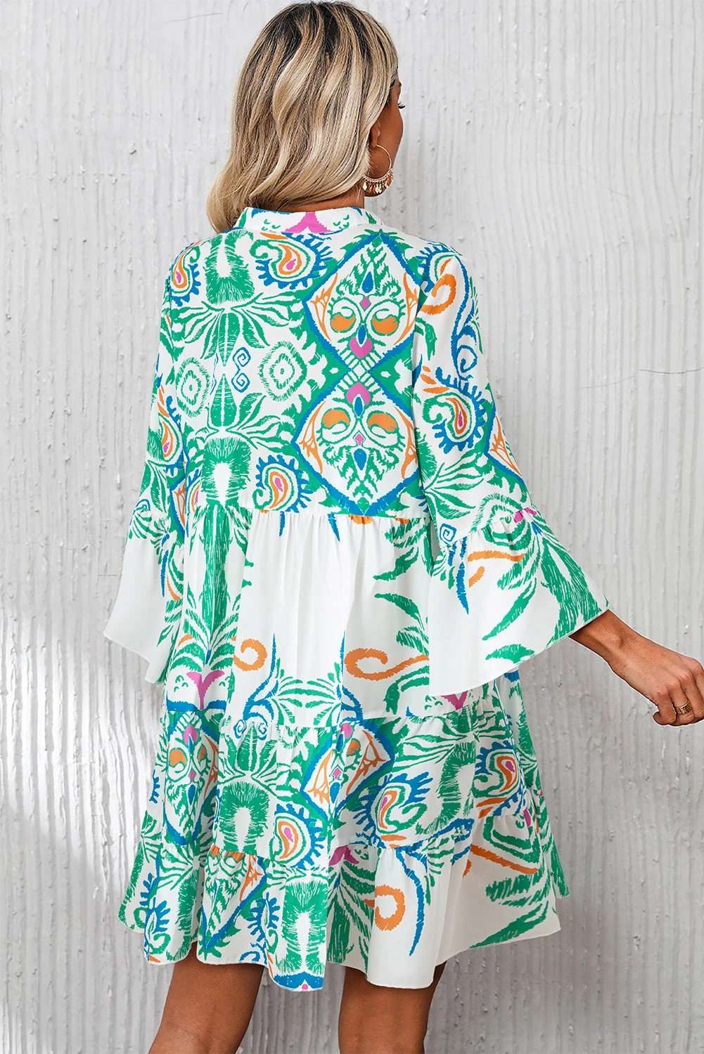 Printed Tribal Mini Dress with buttoned front and bracelet sleeves