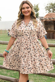 Plus size surplice floral print dress with V-neck and empire waist