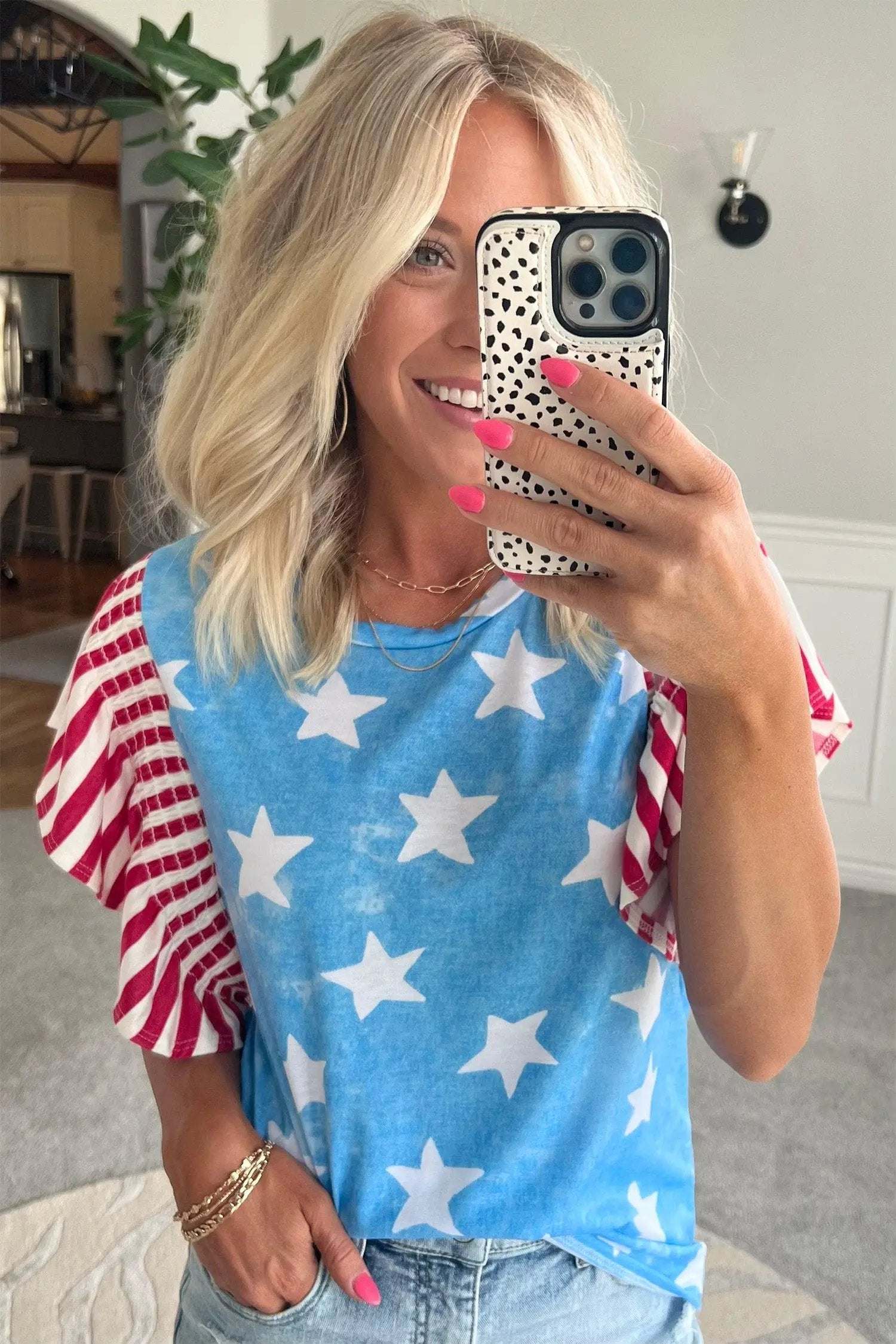 Patriotic Ruffle Sleeve Top with star print striped detail and ruffle sleeves