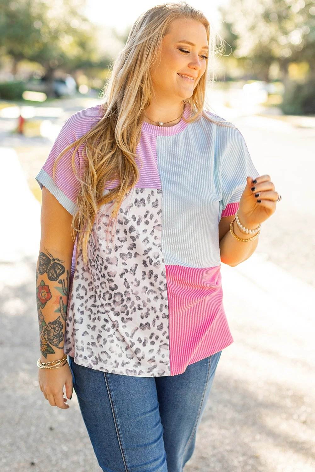 Plus size patchwork leopard corded knit tee on model