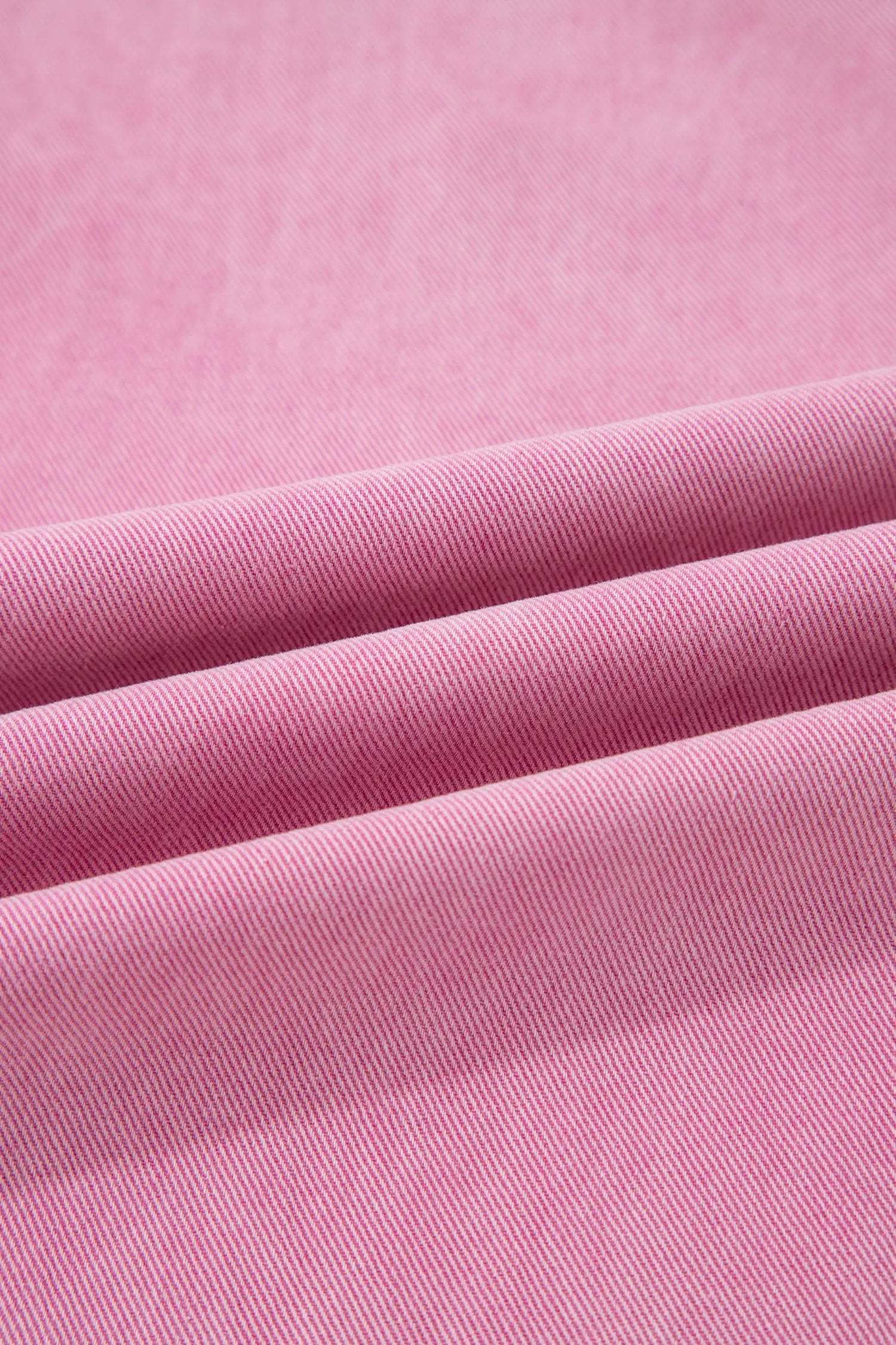 Pink high-rise wide-leg jeans with beaded side detail and split hem