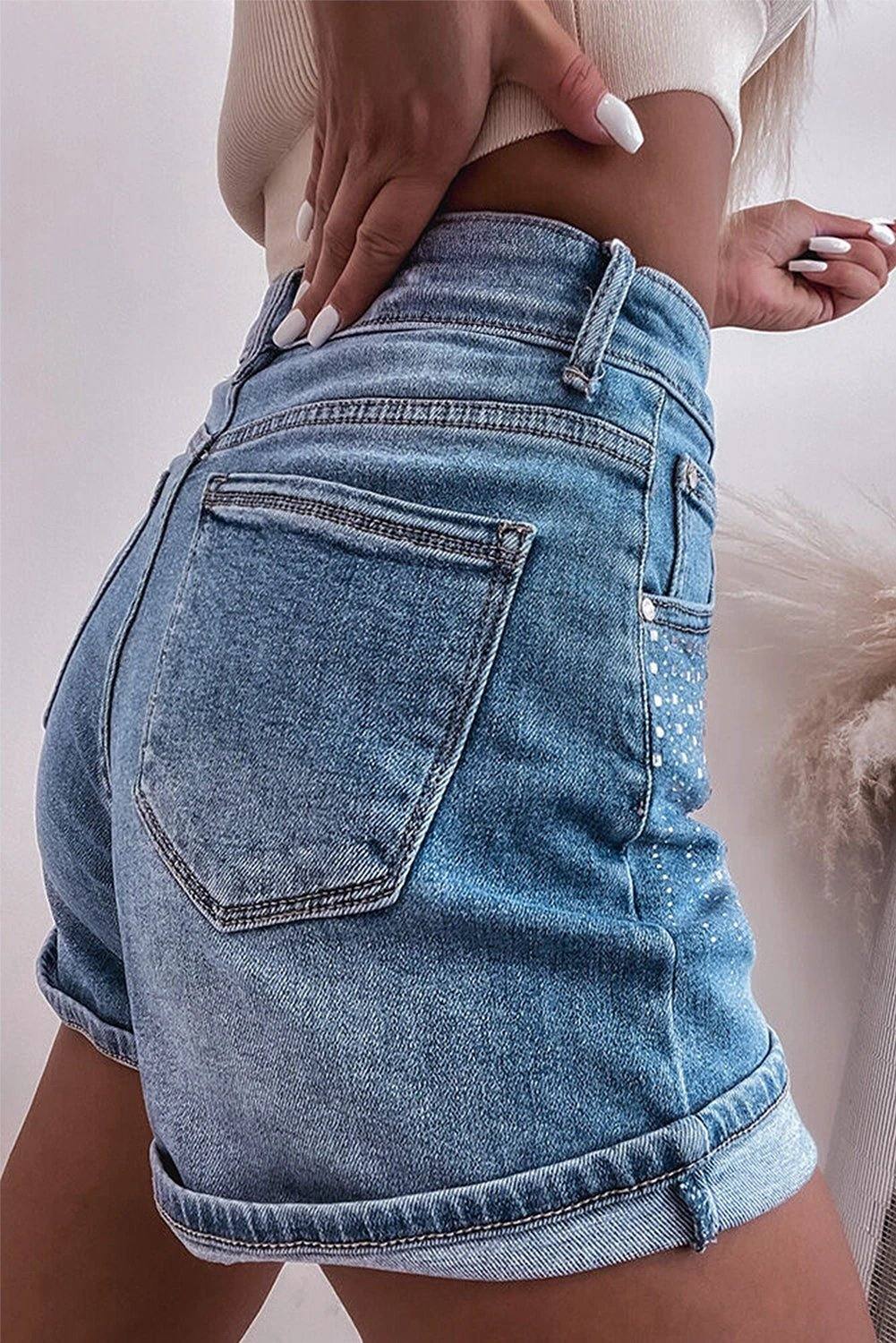 High-rise blue denim rhinestone embellished Summer Spark shorts with Western rolled cuff