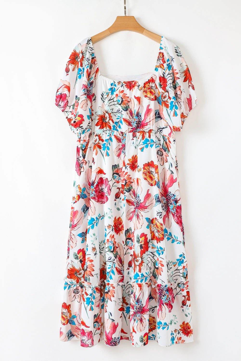 Plus size Sunday Ready floral midi dress with square neckline and puff sleeves on white background