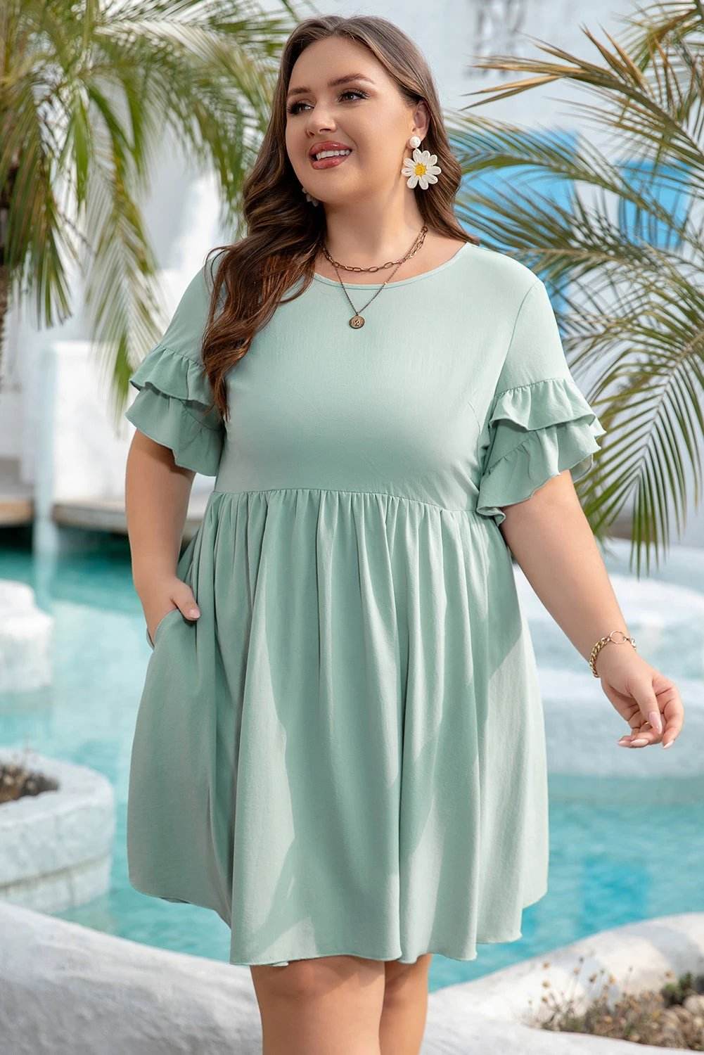 Plus size Effortless Glow mini dress with ruffle trim short sleeves and flared A-line silhouette in mint green