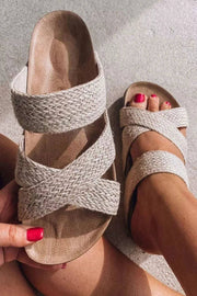 Woven criss-cross slip-on sandals with breathable hollowed straps and cushioned footbed for everyday comfort
