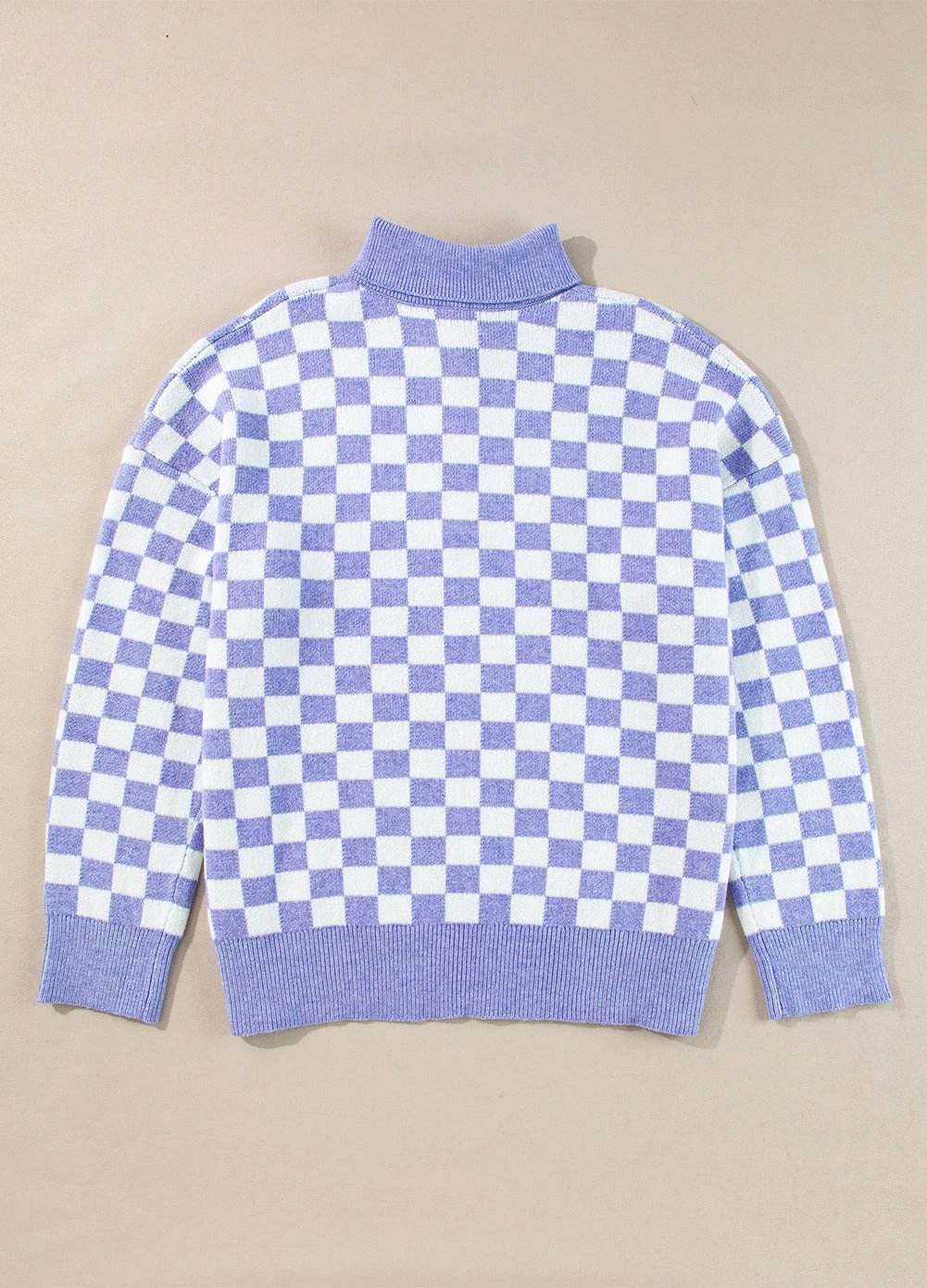 Plus size checkered purple collared button front sweater on model