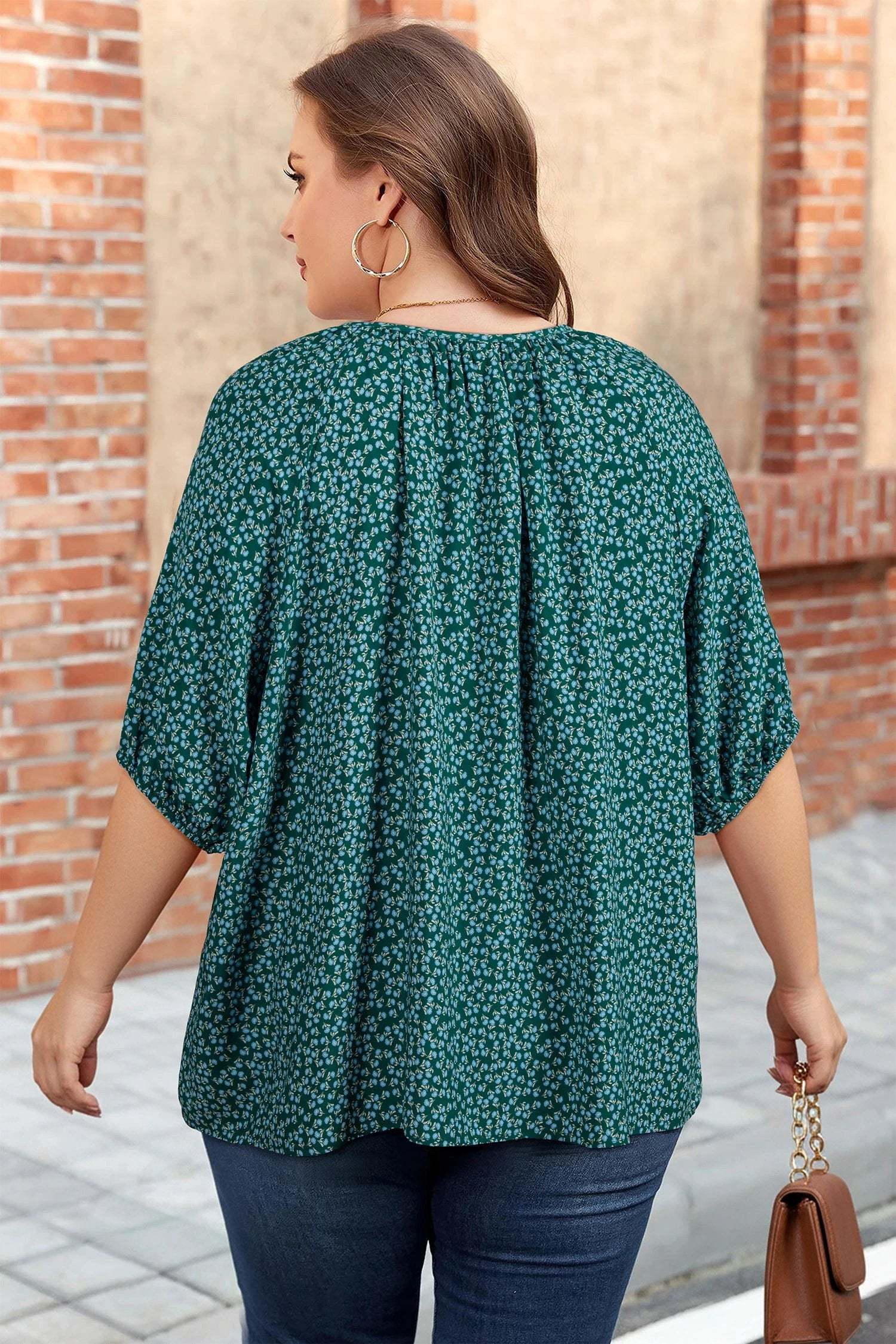 Plus size floral Effortless Boho notched V neck short sleeve top in emerald green