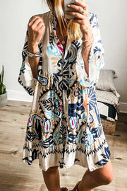 Printed Tribal Mini Dress with buttoned front and bracelet sleeves