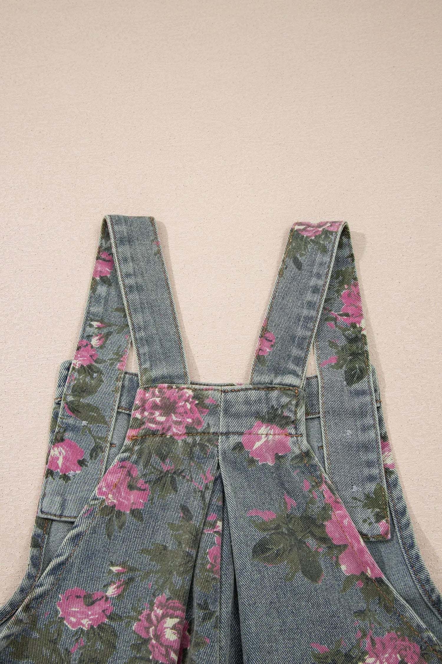 Floral Denim Jumpsuit with pleated high-waist and wide-leg silhouette