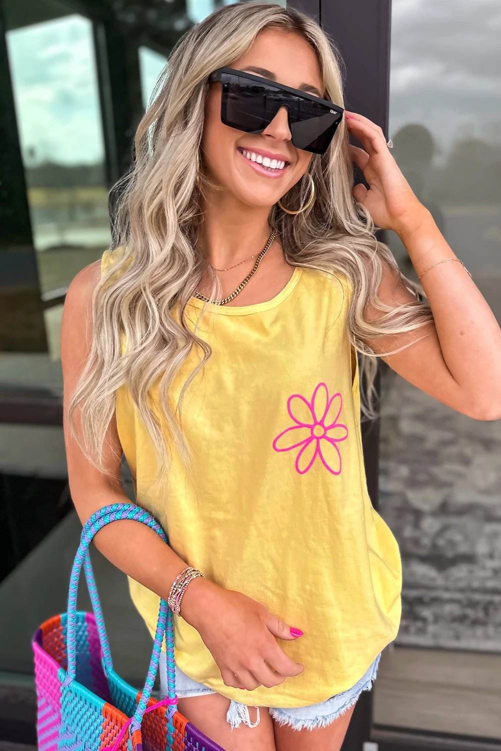 Yellow floral graphic tank top with sun-kissed confidence design, breathable and stretchy fabric for casual summer wear