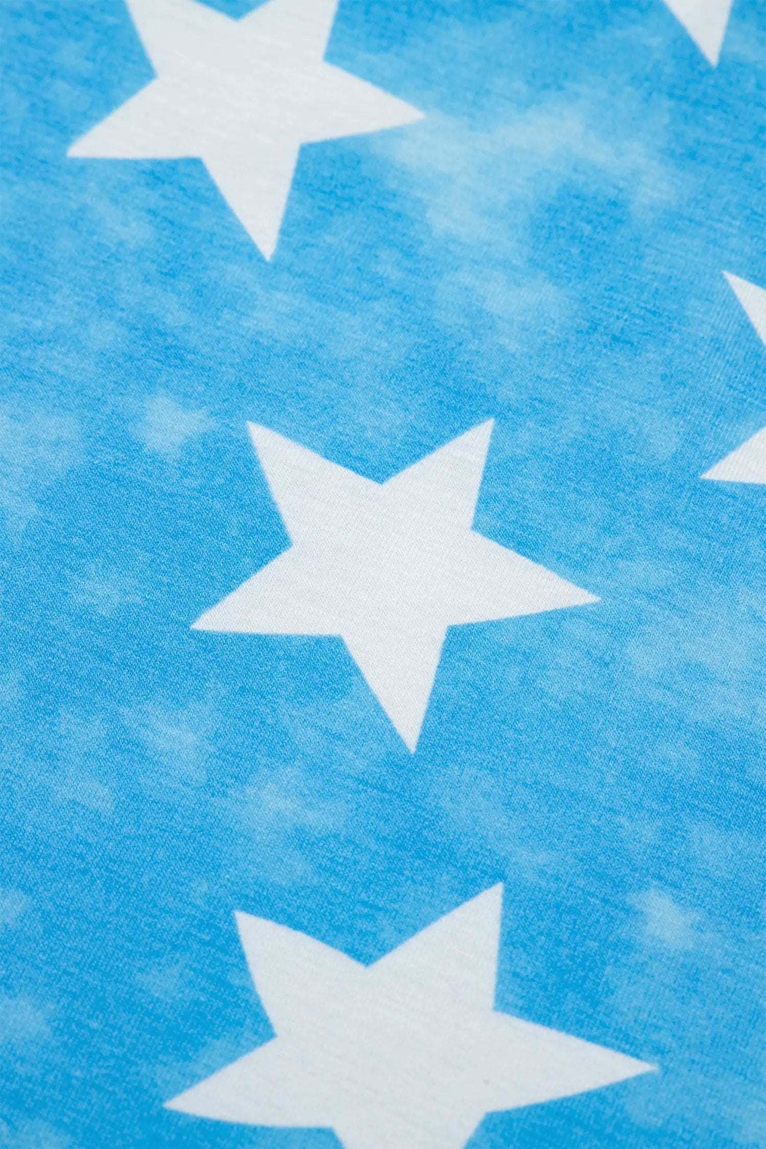 Patriotic Ruffle Sleeve Top with star print striped detail and ruffle sleeves