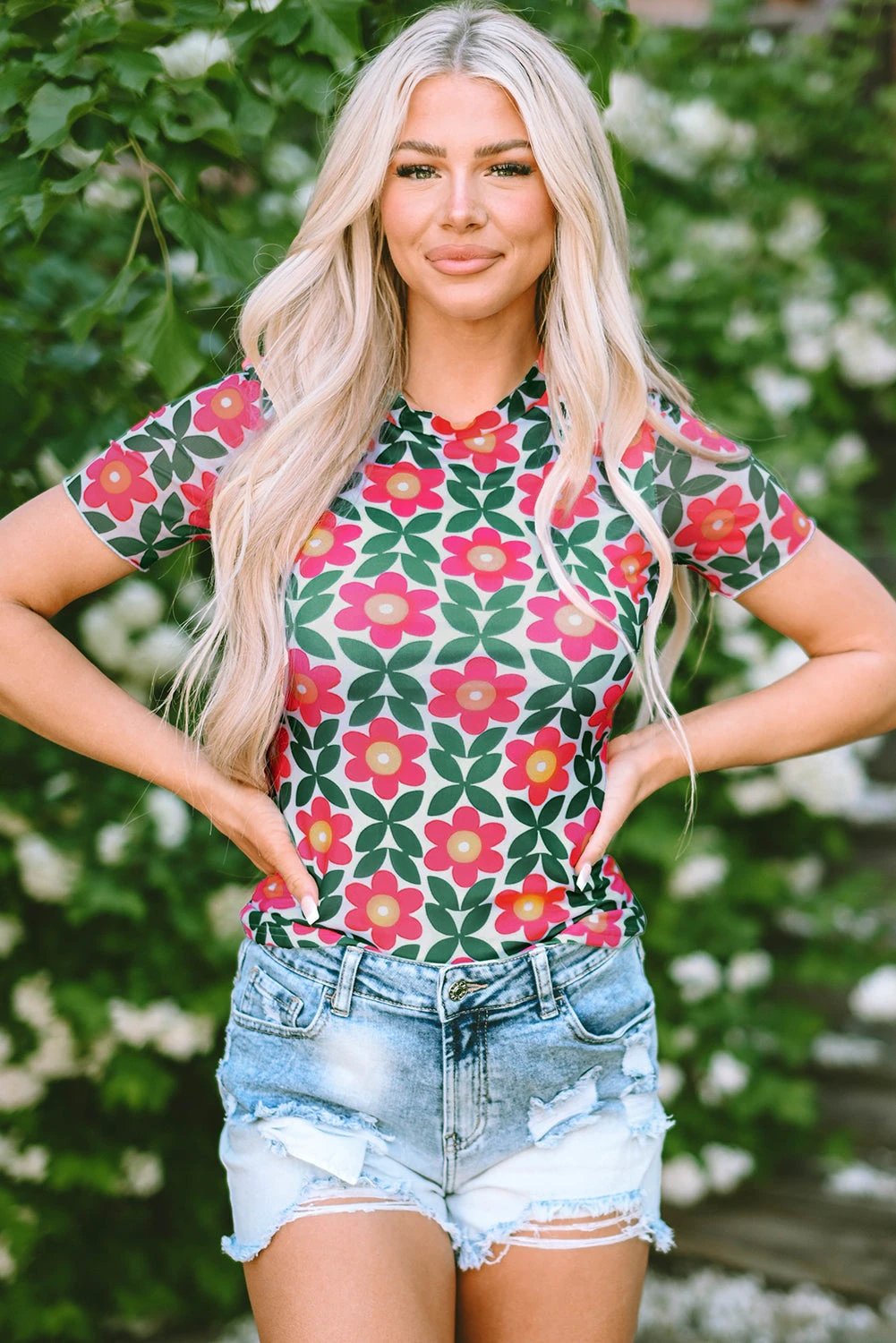 Red retro floral print crew neck t-shirt with pink and green flowers by Bloom Energy