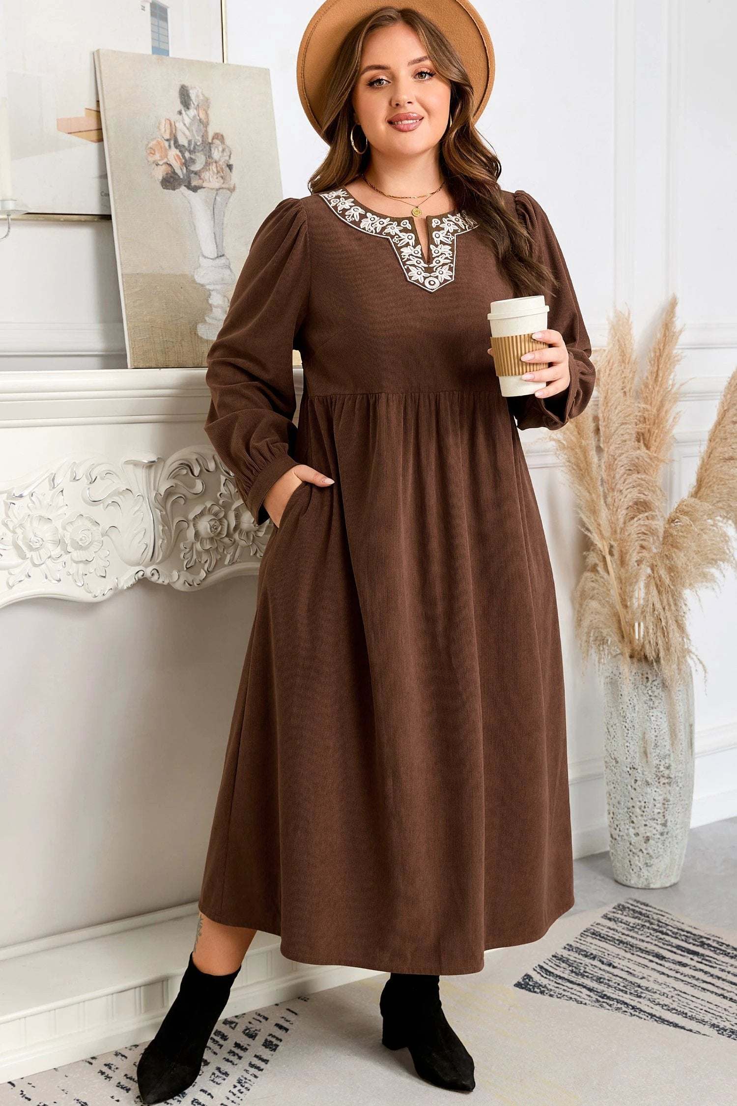 Plus size embroidered midi dress with notched neckline and long sleeves showing main character energy style