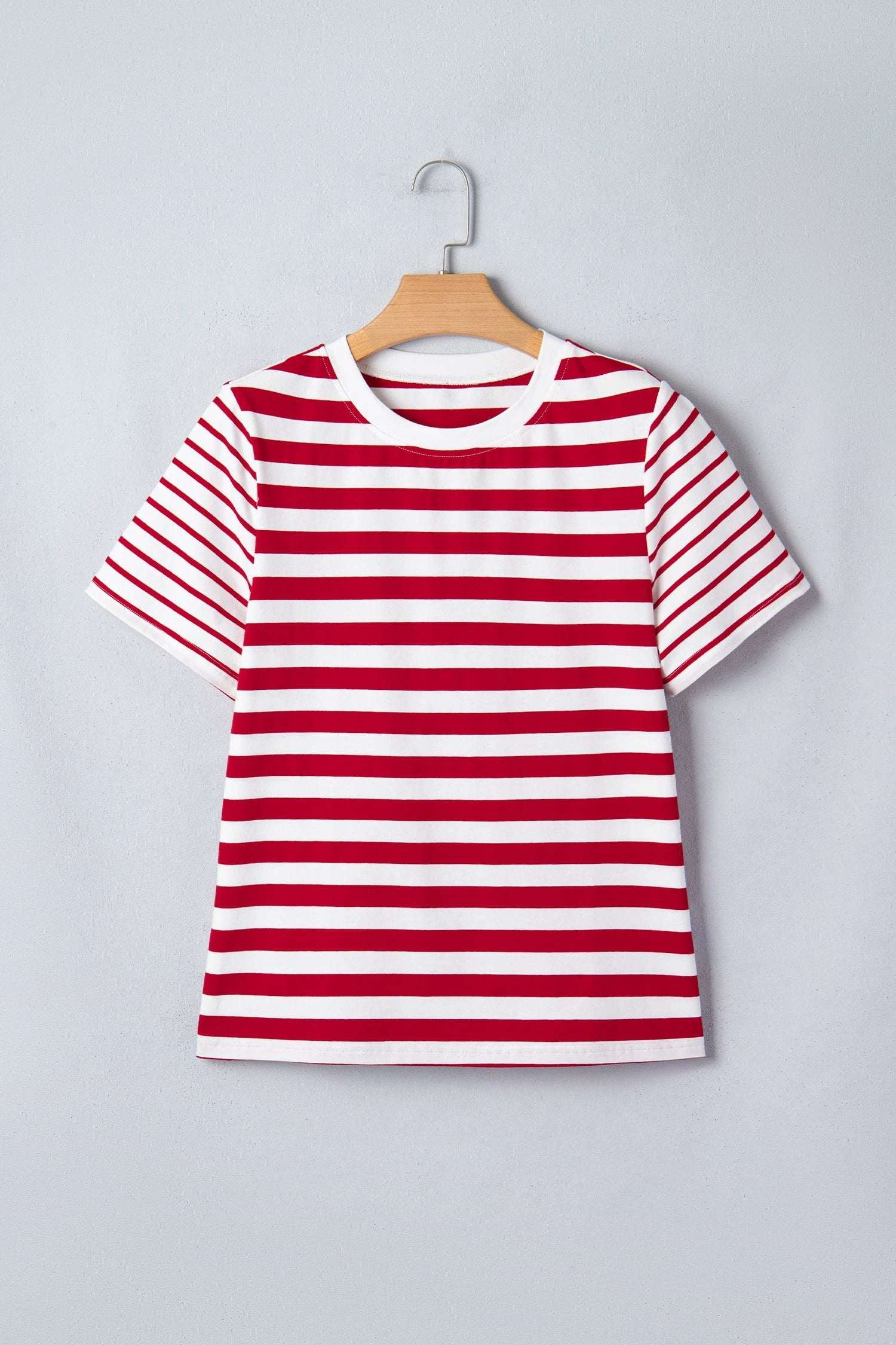 Woman wearing a Colorblock Stripe Tee with a round neck and short sleeves
