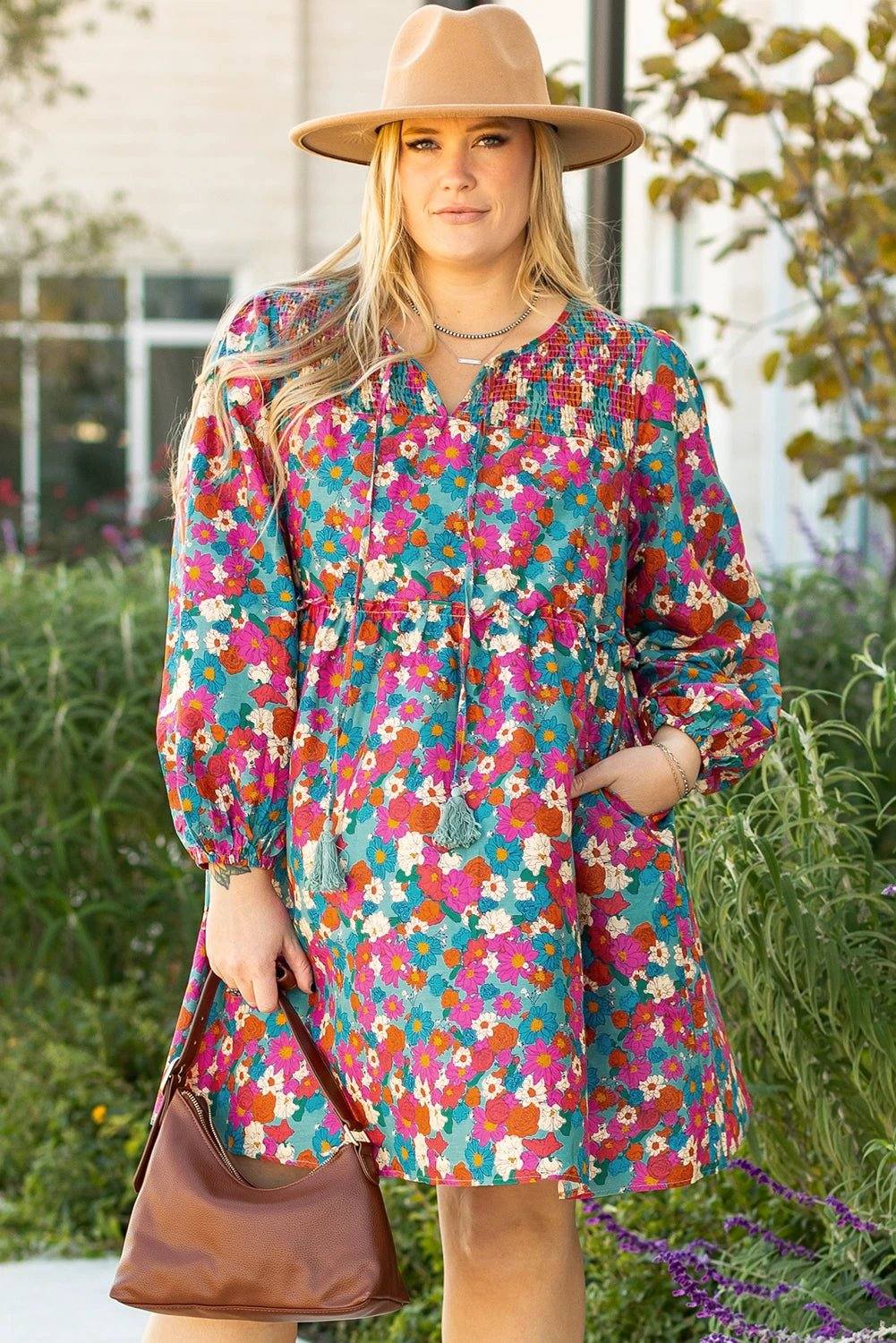 Plus size floral shirred ruffle tiered mini dress with lightweight fabric and flattering fit