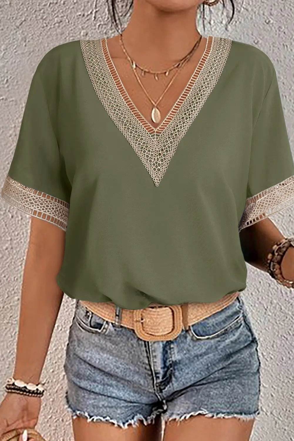 Boho Chic lace trim V-neck blouse with short sleeves and relaxed fit