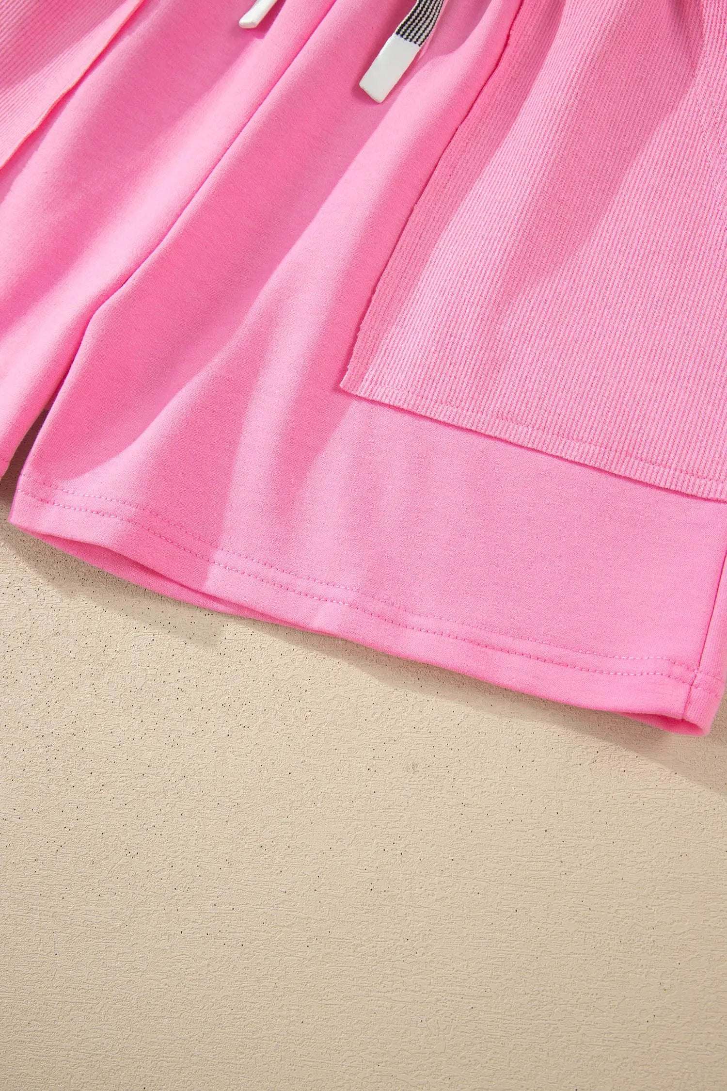 Pink Mom Chic two-piece V-neck top and drawstring shorts set