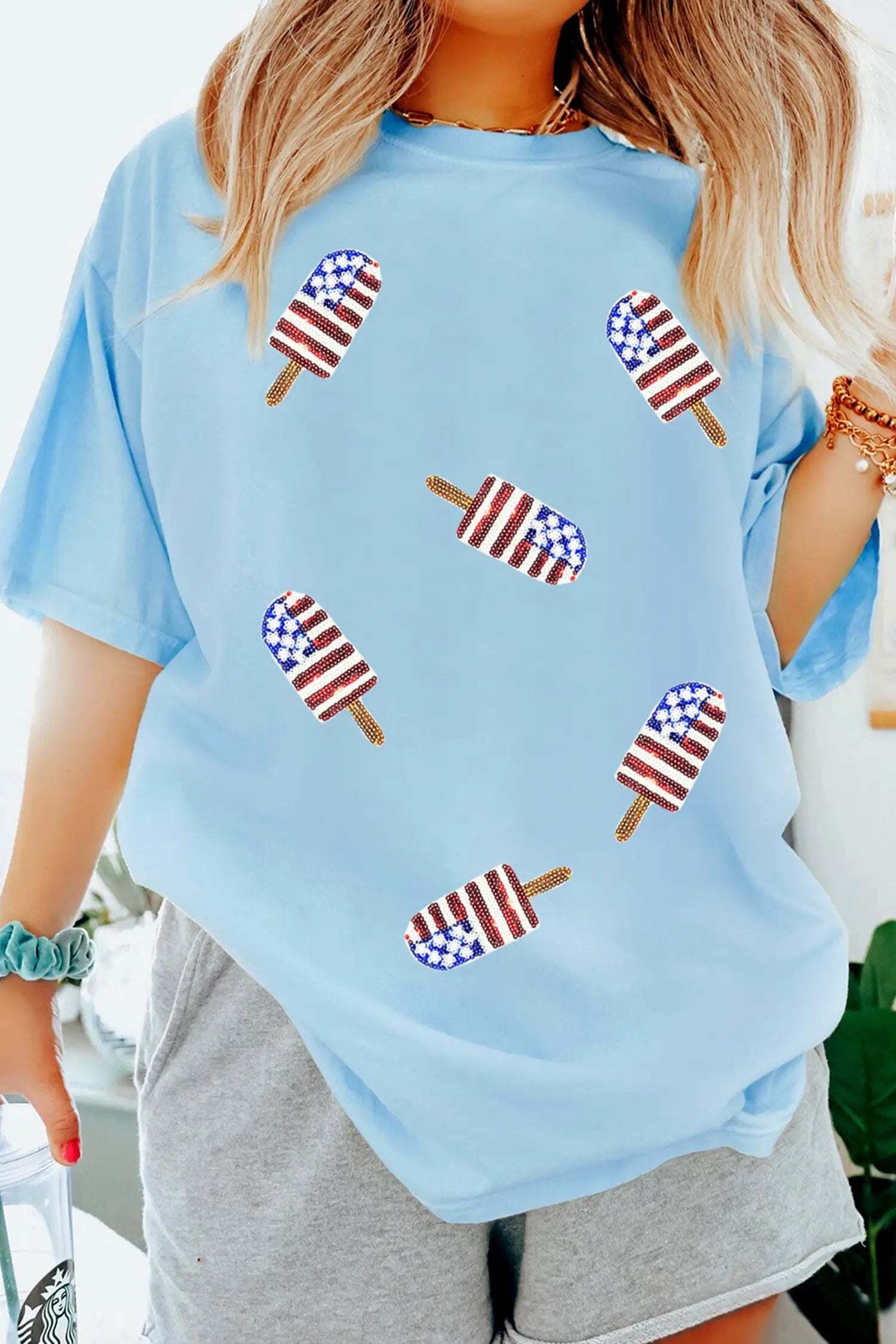 Light blue Patriotic Vibes tee with sequin popsicle graphic in red, white, and blue colors for summer style