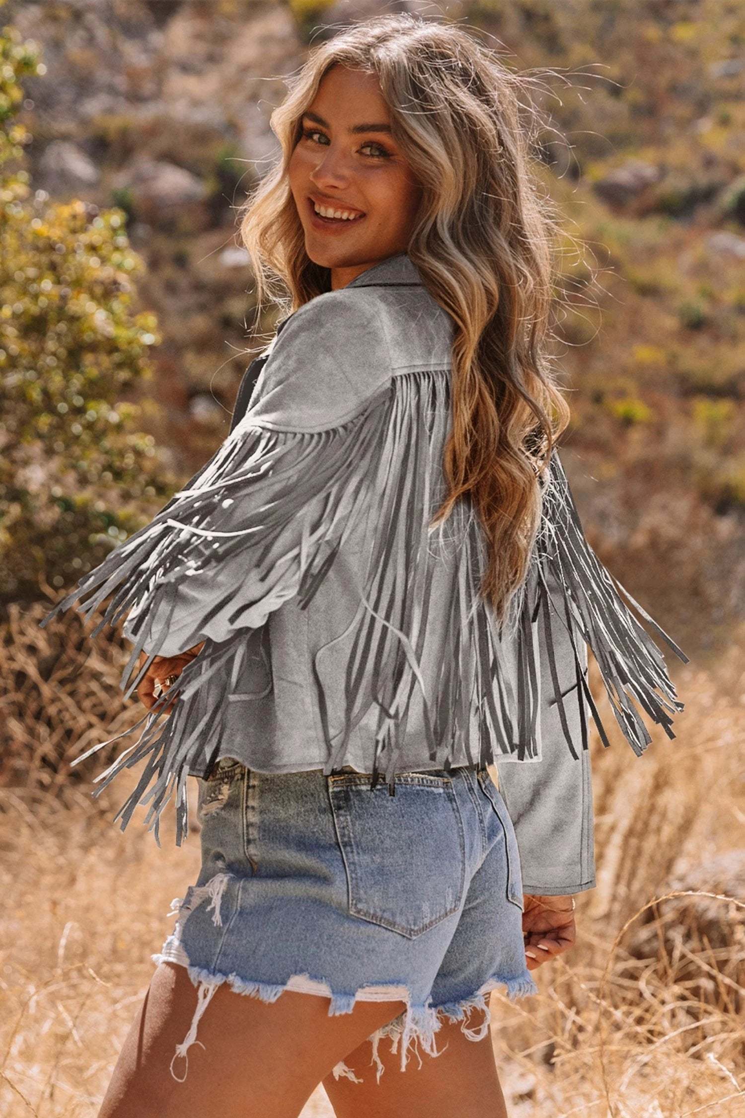 Cropped faux suede jacket with western fringe detailing and main character energy style
