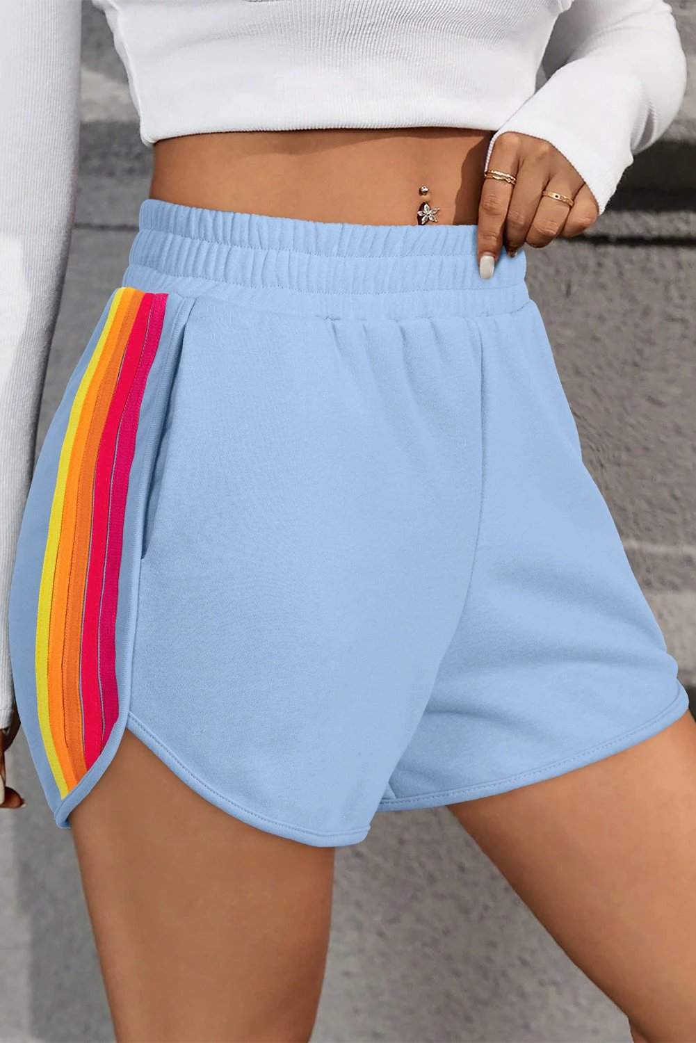 Pink high waist active shorts with color block stripes and elastic waistband
