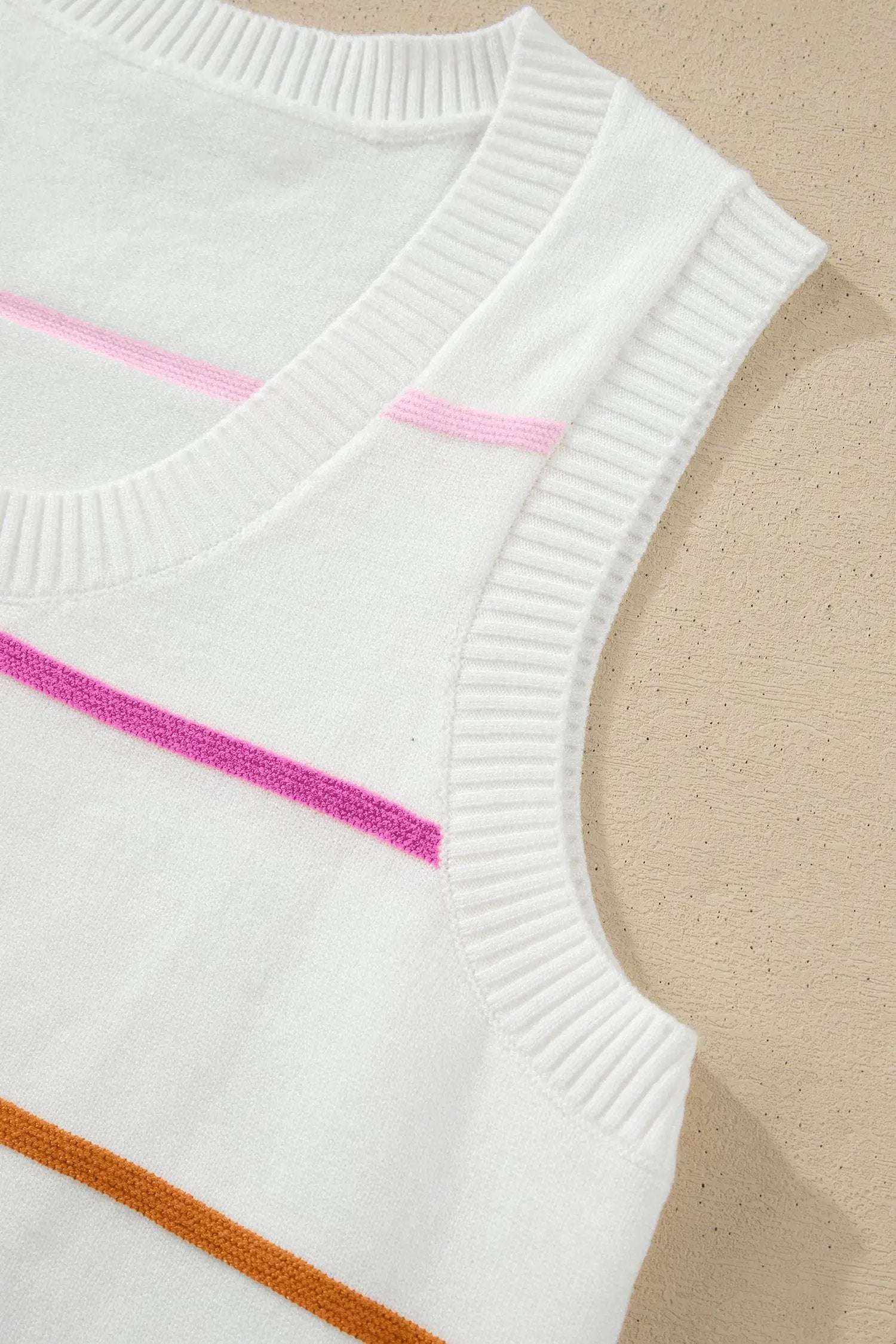 Striped round-neck knit sleeveless tank top with color-block accents for casual wear