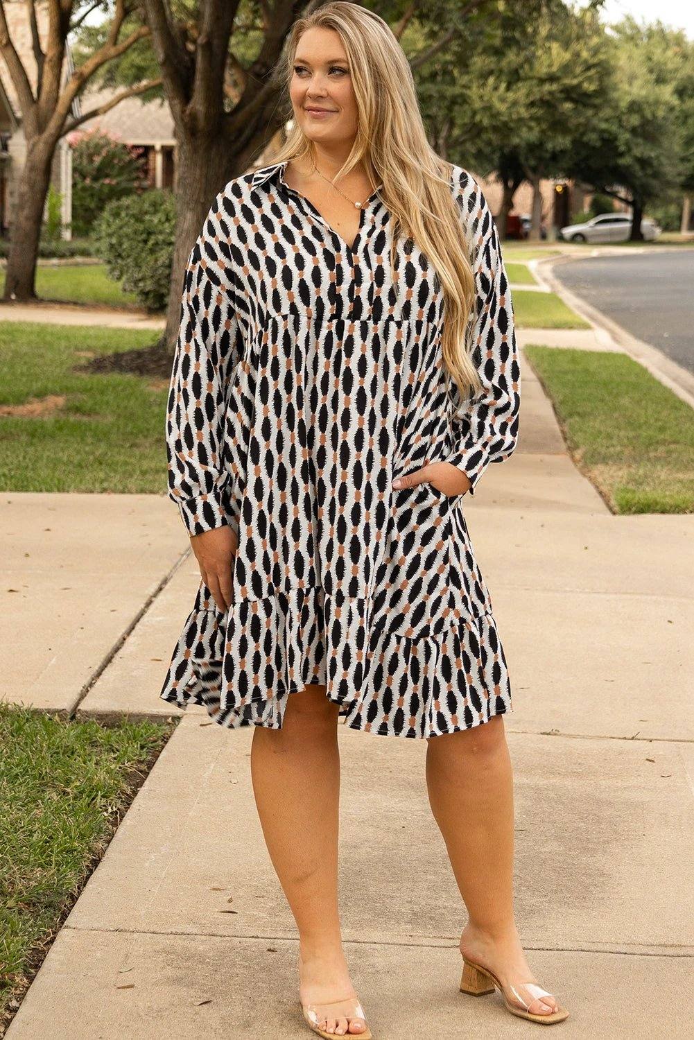 Plus size geometric print mini dress with collared V-neck and main character energy design