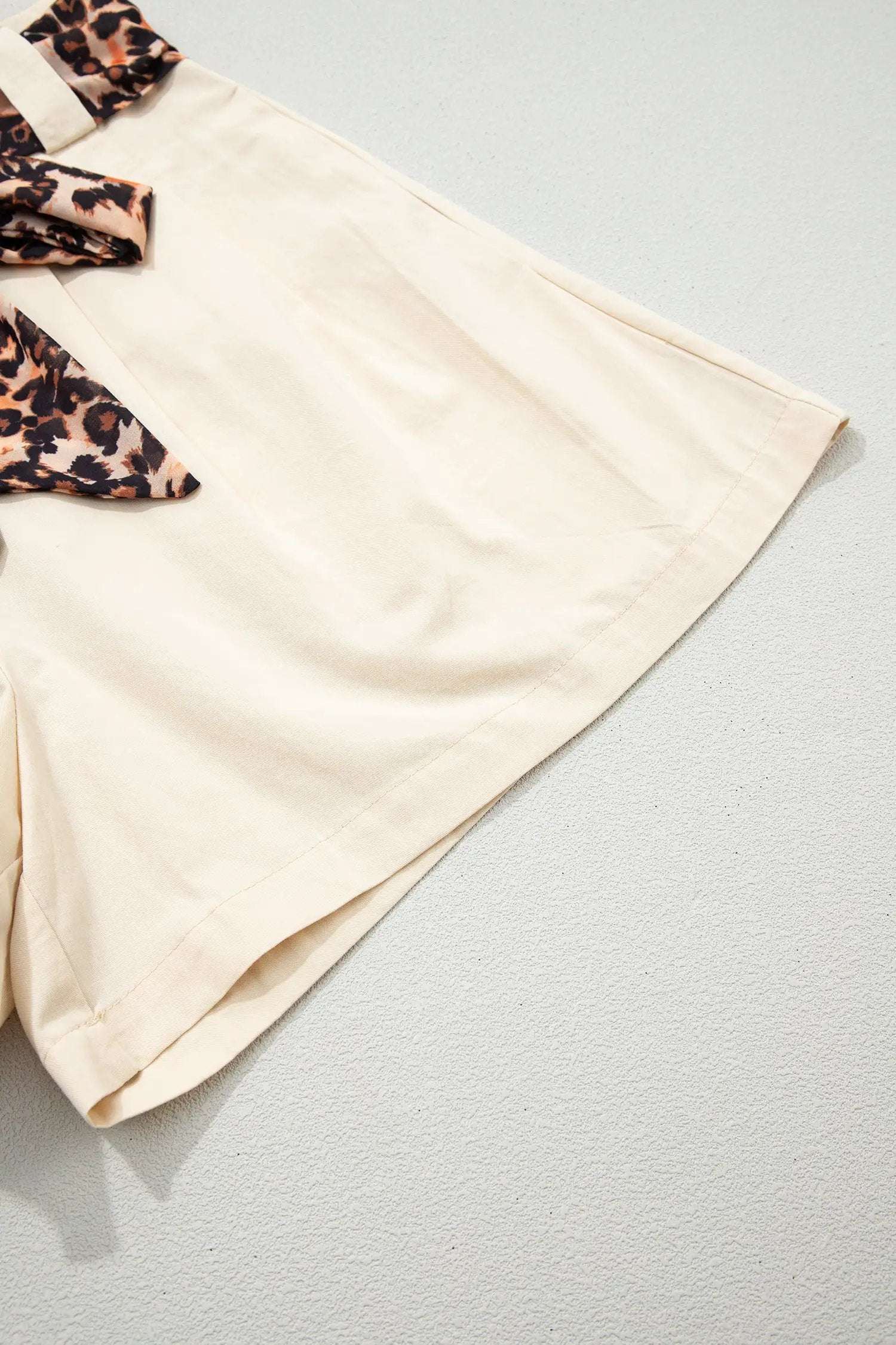 Pink pleated wide leg shorts with leopard contrast sash belt for Weekend Vibe look