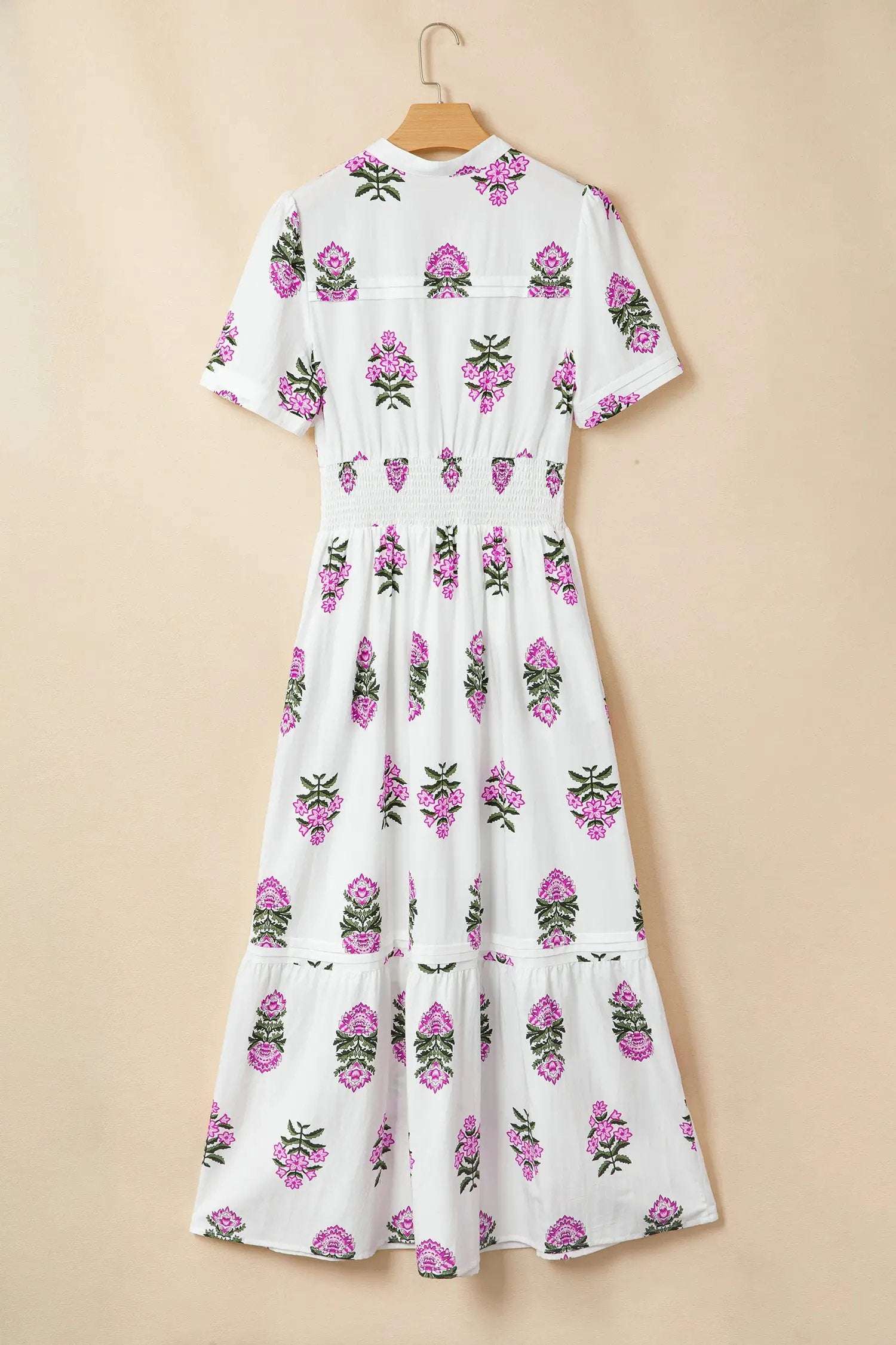 Floral print maxi dress with split neck, shirred waist, and ruffle hem showcasing main character energy style