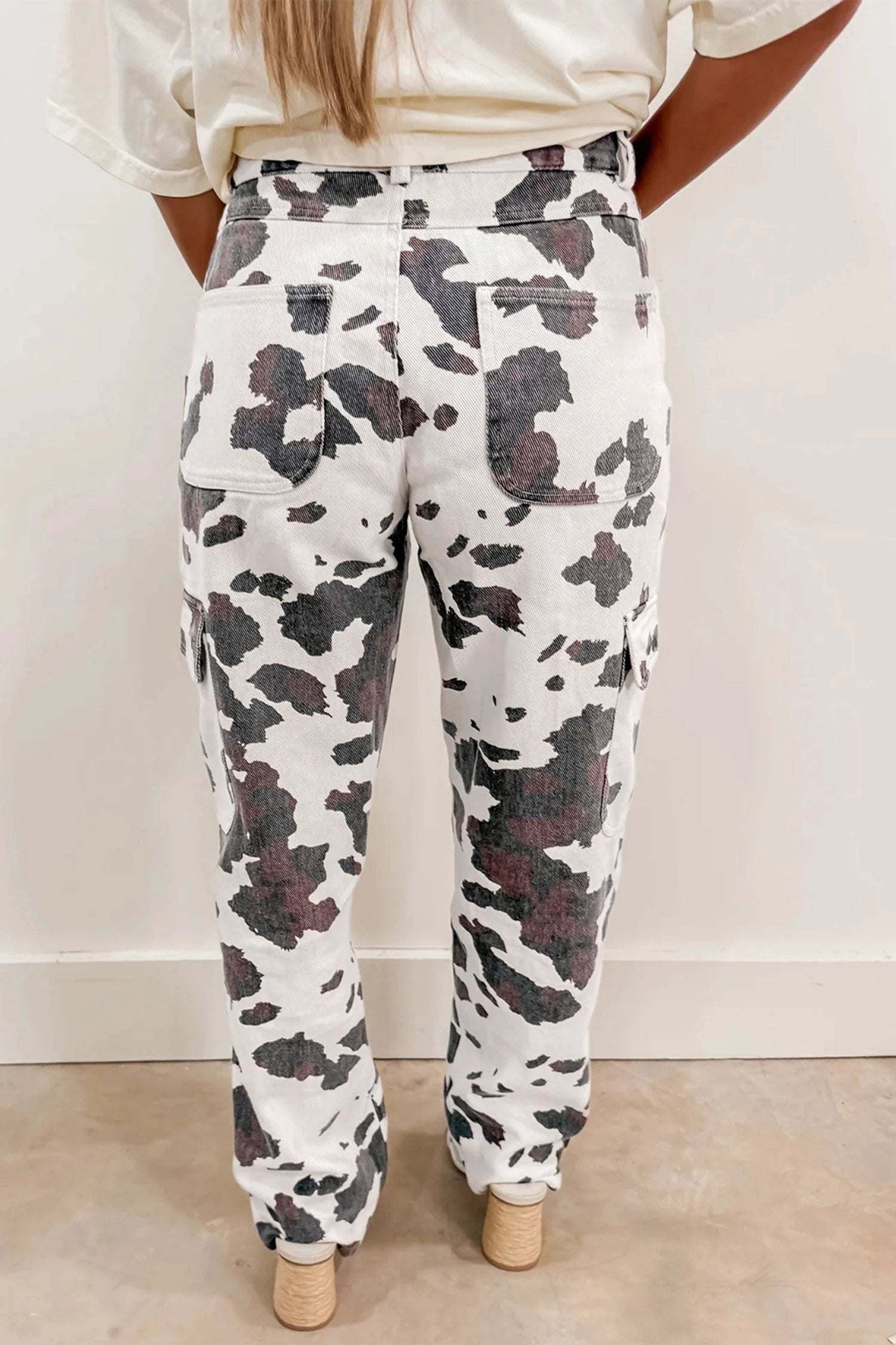 Brown cow spots printed multi pocketed jeans for women casual everyday outfit