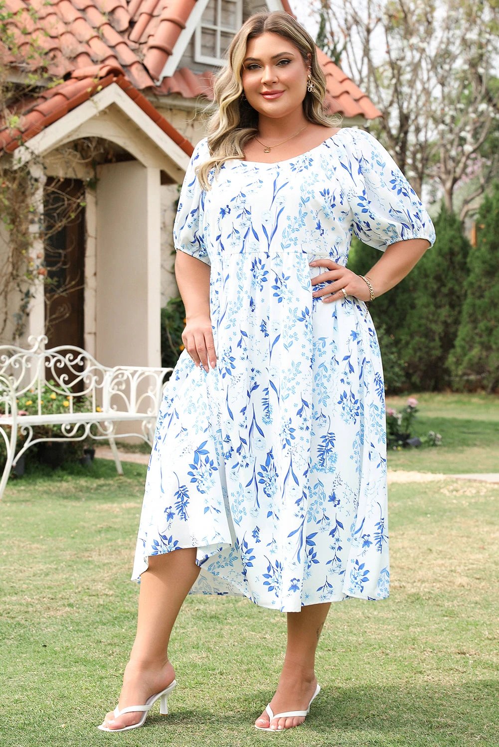 Plus size sky blue floral print midi dress with sweetheart neckline and puffed sleeves