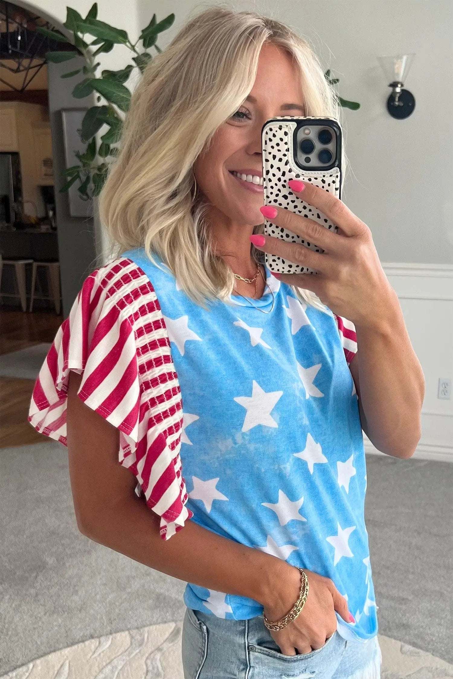 Patriotic Ruffle Sleeve Top with star print striped detail and ruffle sleeves