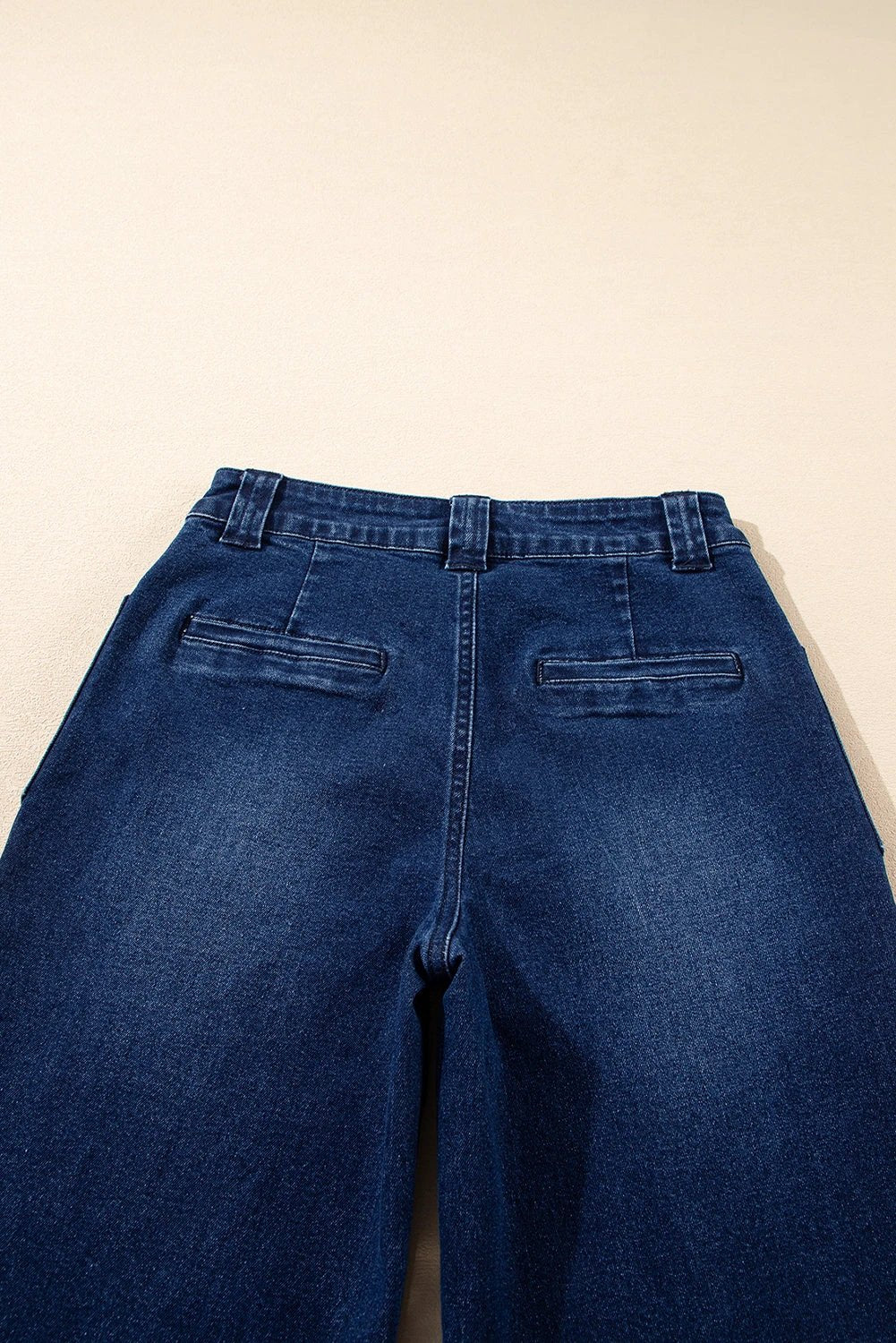 Dirty blue mid-rise straight-leg Chic Mom jeans with five-pocket styling and button closure