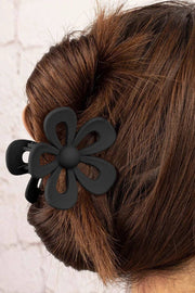 Black hollow flower shape claw clip with frosting finish hair accessory