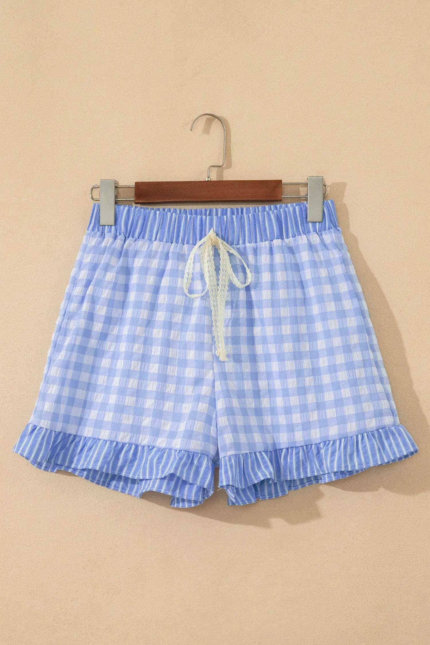 Gingham ruffle hem shorts with lace tie waist in lightweight breathable fabric