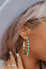 Cowgirl Glow turquoise gem inlay retro C-shape hoop earrings on white background
