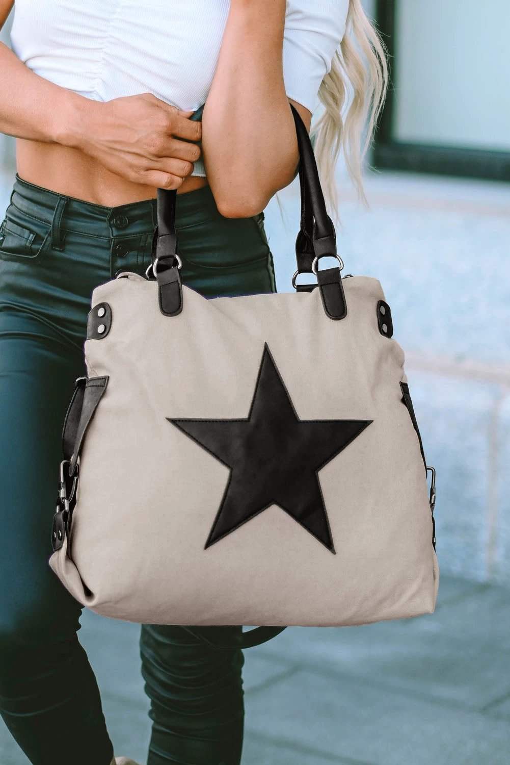 Beige canvas Everyday Tote bag with bold black star detail and adjustable straps