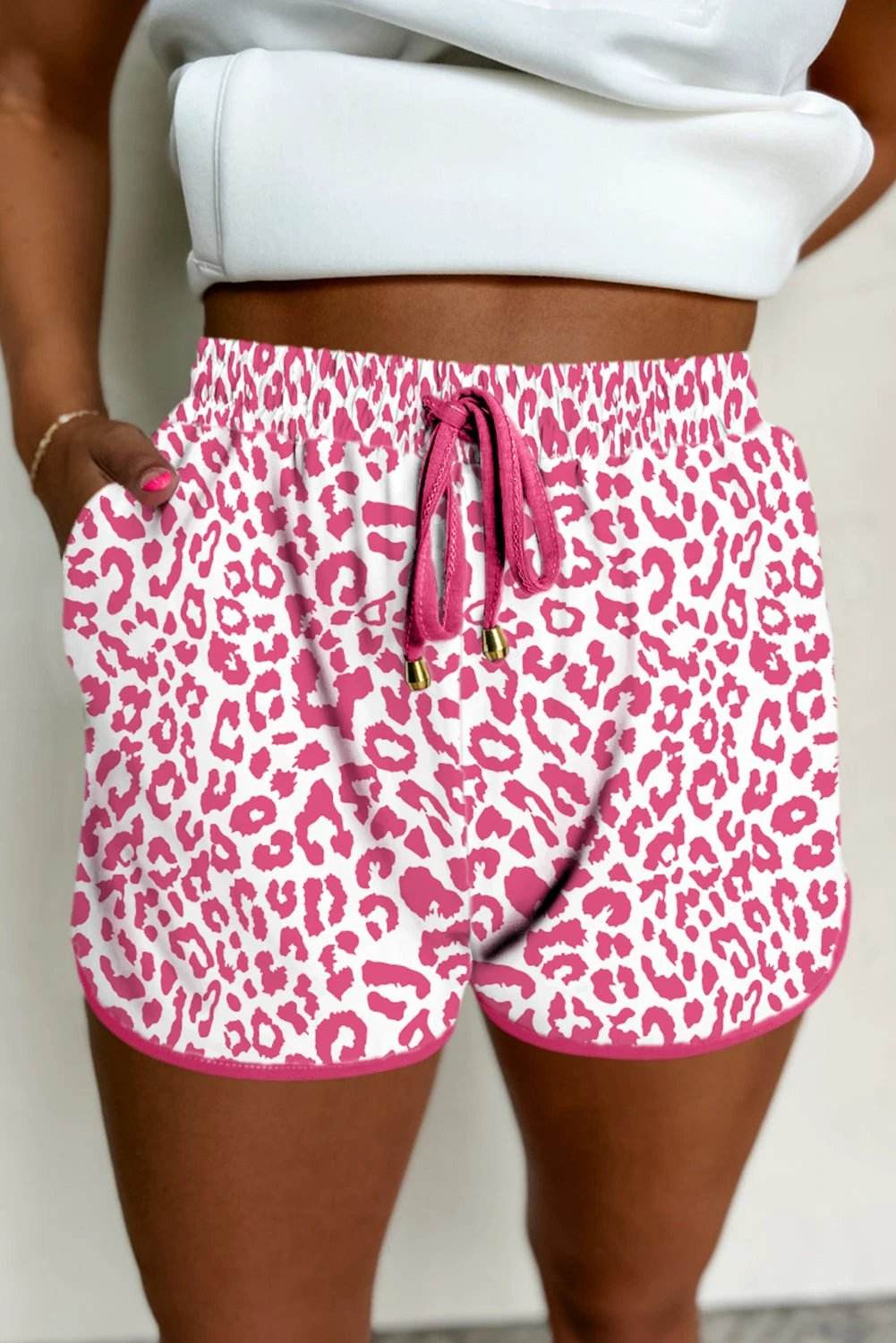 Leopard print elastic waistband shorts with lace-up trim and contrast edging for effortless mom style