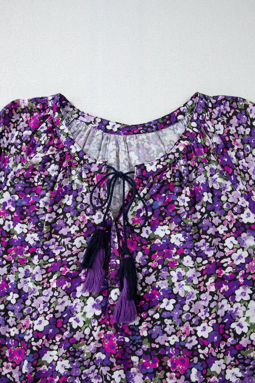 Purple floral Boho Bloom split V-neck bubble sleeve blouse with tassel fringe hem