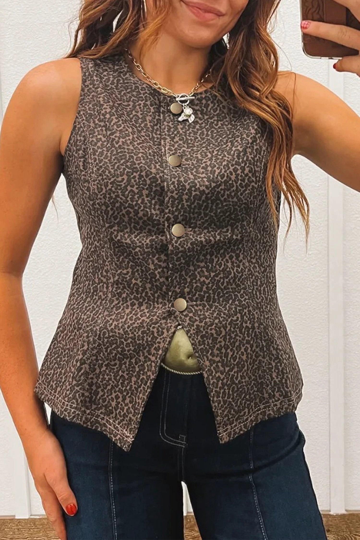 Brown leopard print slim denim vest with brass snap buttons and sleeveless cut