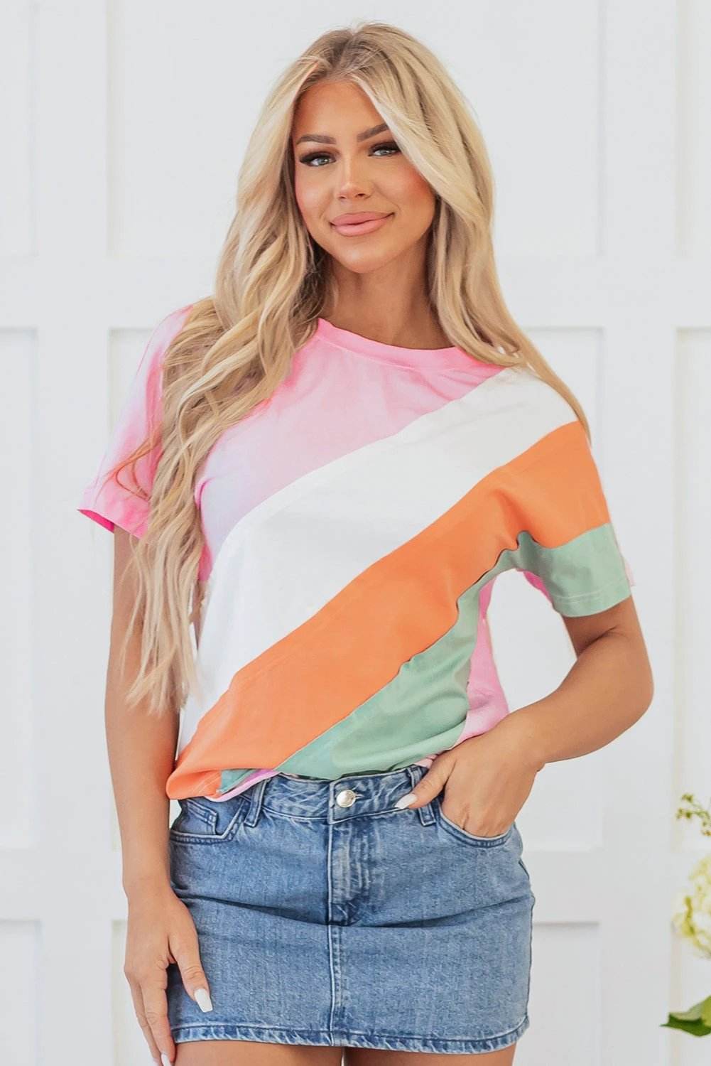 Color block patchwork crewneck tee with pink, orange, mint, and white diagonal design
