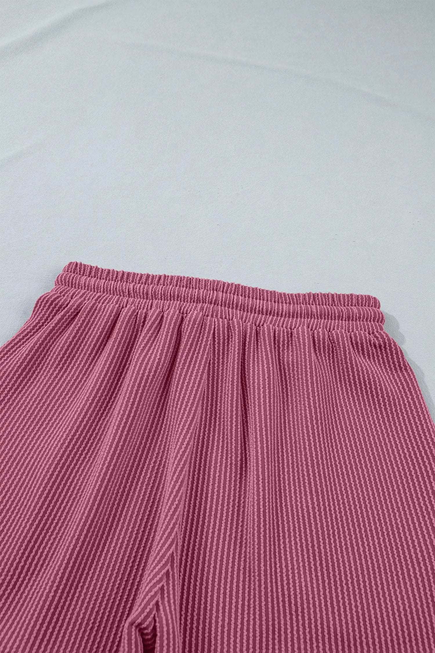 Soft pink twisted ribbed two-piece set with loose tee and shorts for moms