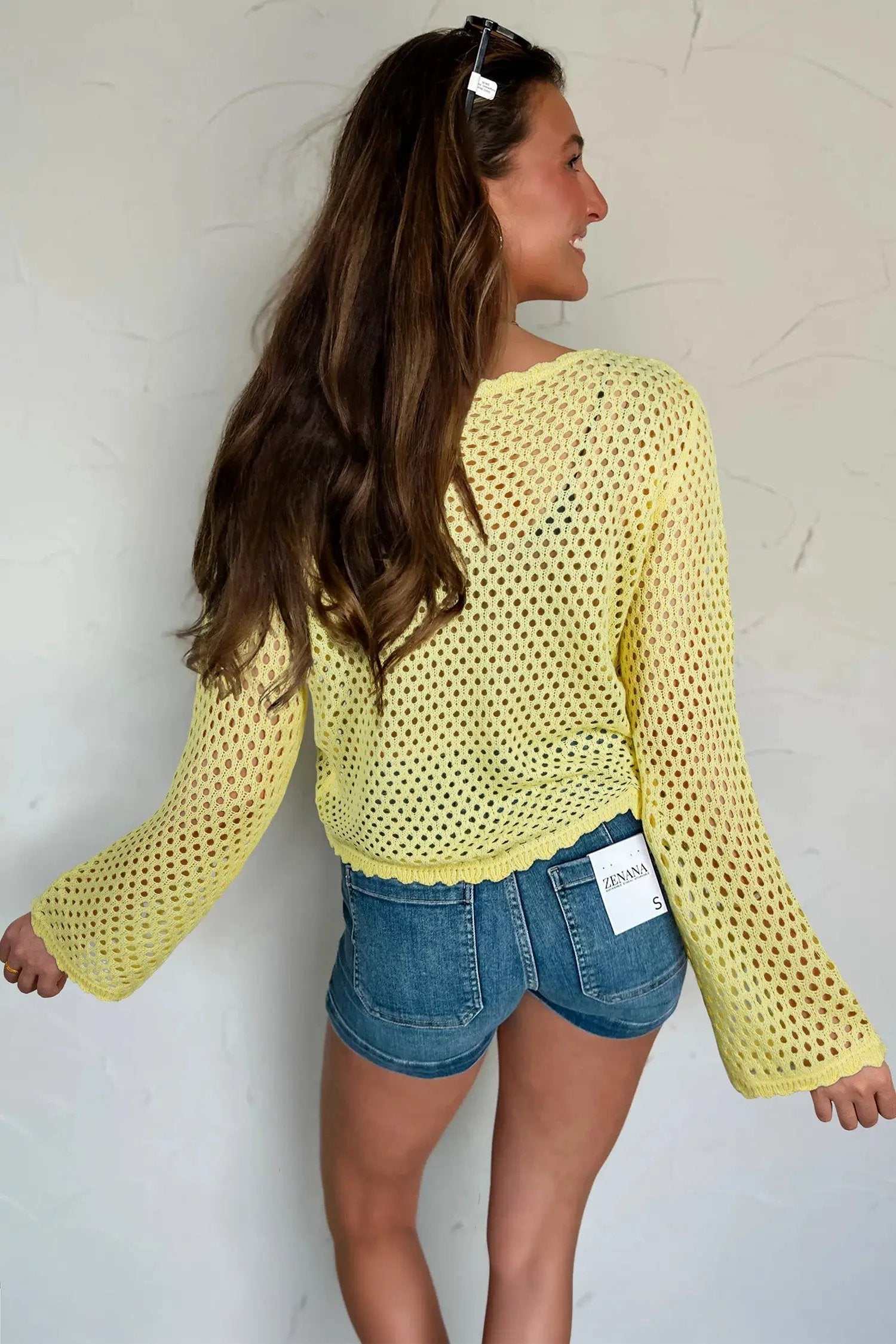 Hollow Out Knit Top with scalloped trim and long sleeves
